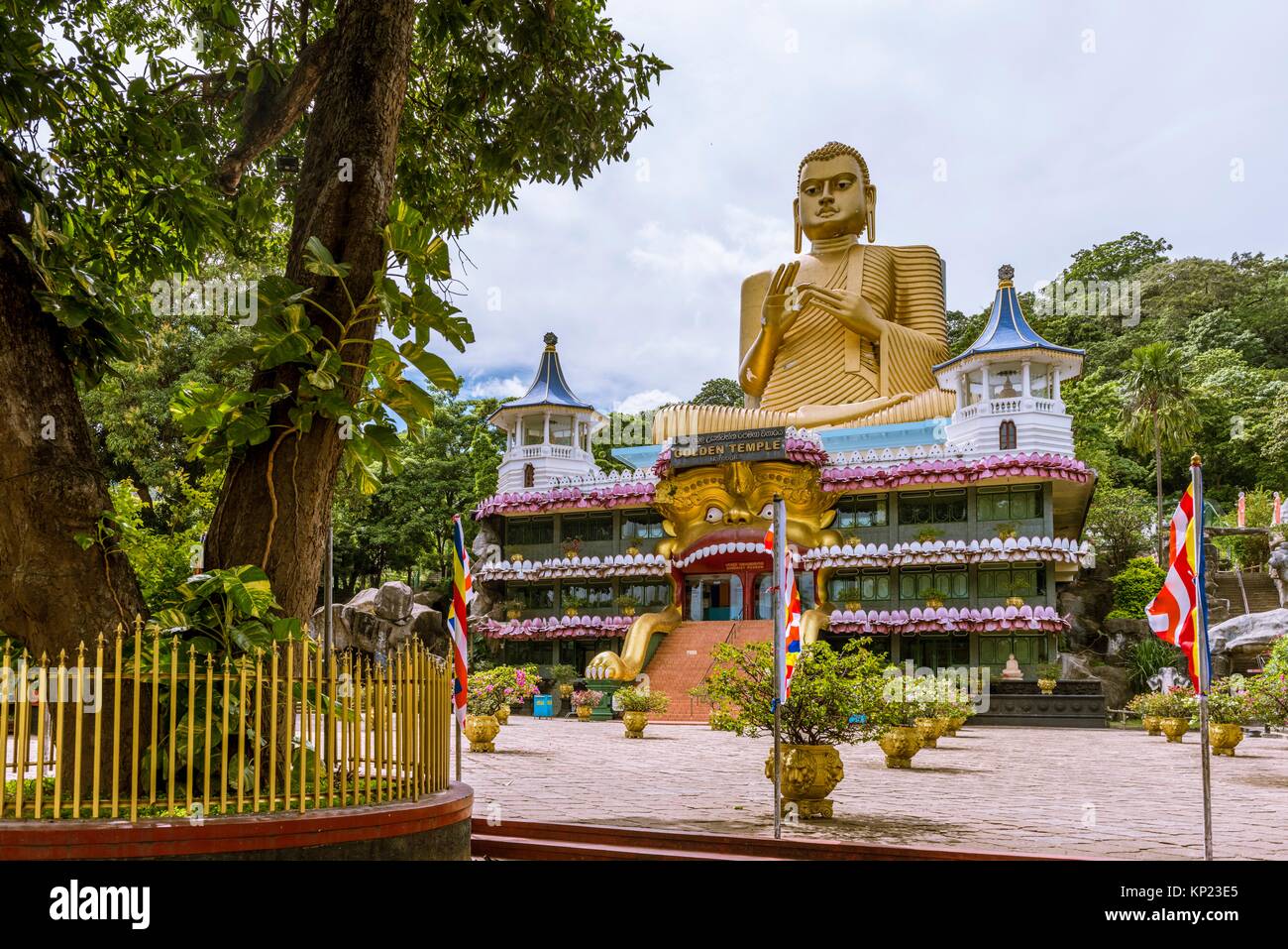 Giant golden buddha statue at dambulla cave temple complex hires stock