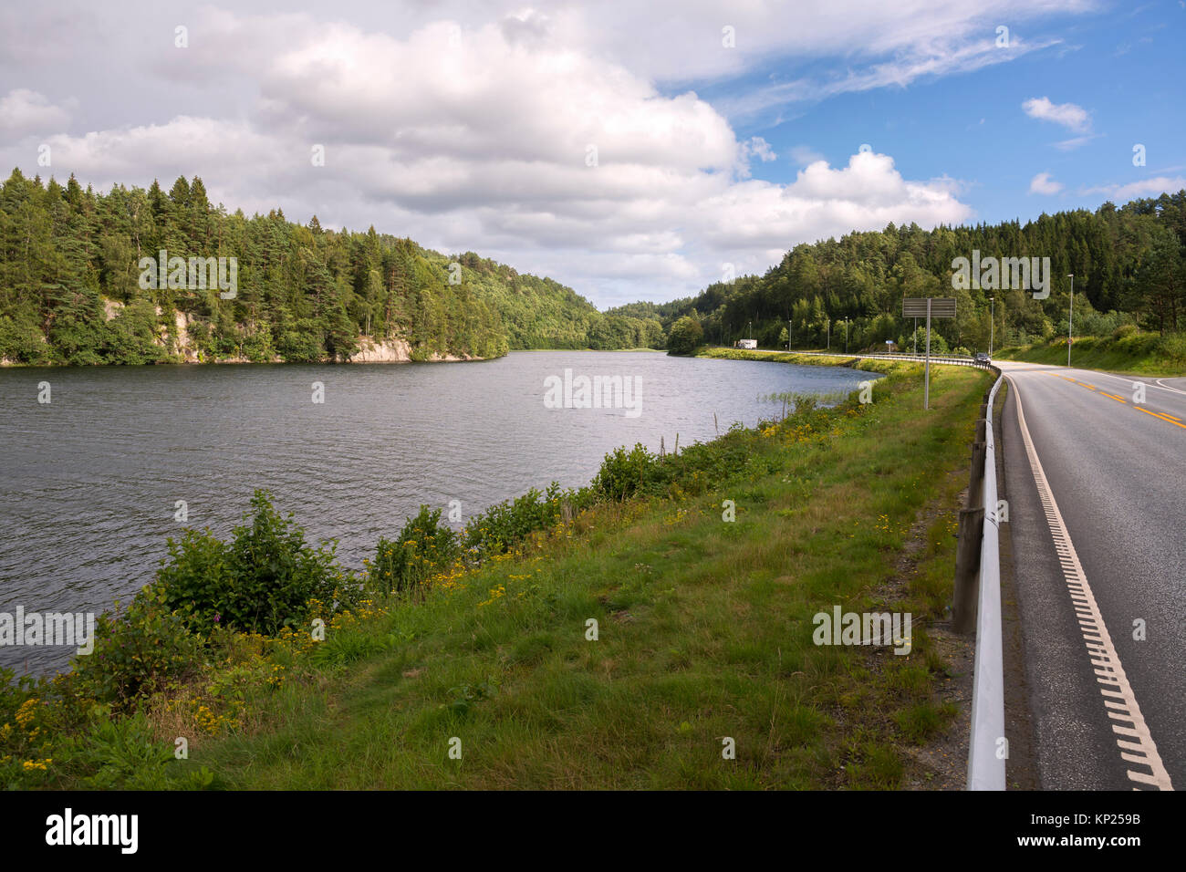 road on the river in the surroundings of Egersund in Norway Stock Photo
