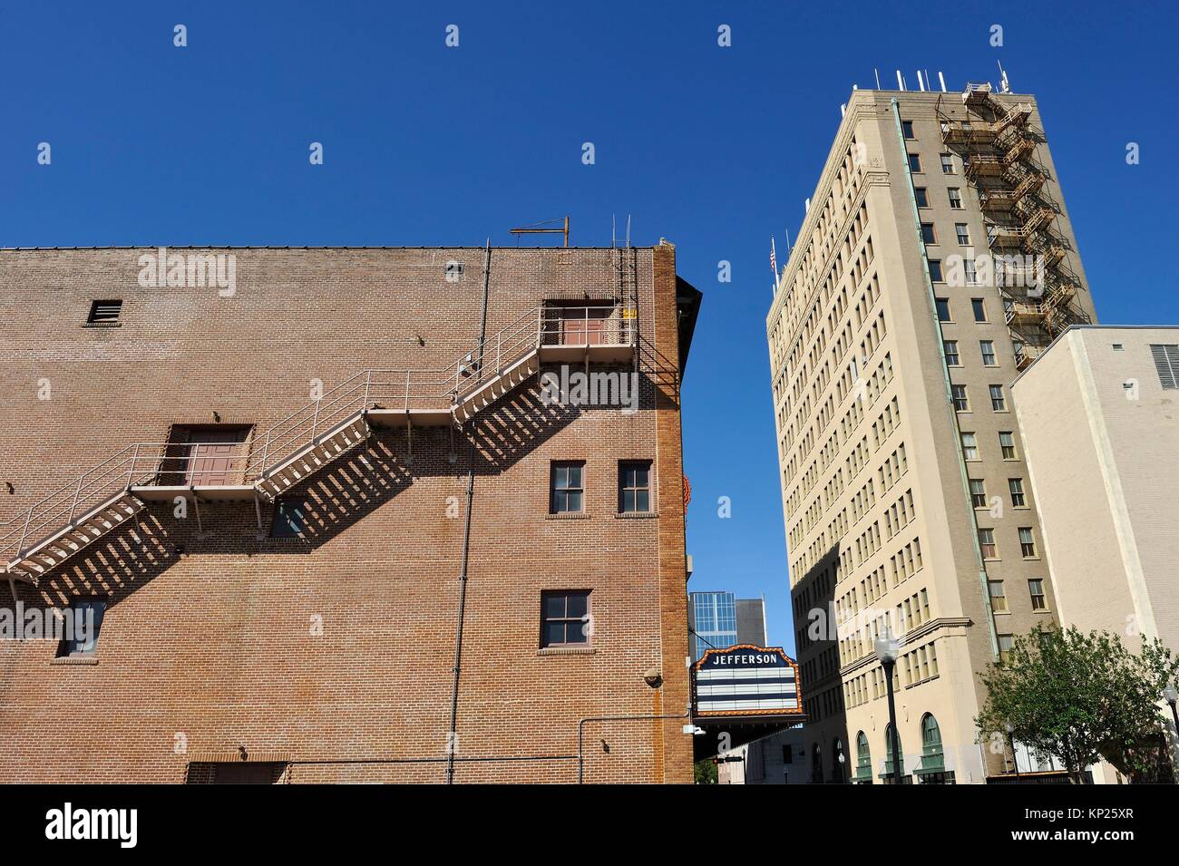 fire escape of Jefferson Theatre with San Jacinto Building in the