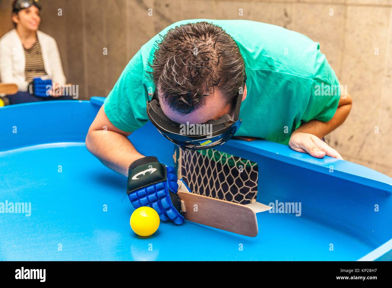 Blind people playing showdown game. Showdown is a fast-moving sport originally designed for people with a visual impairment, but you don´t have to be Stock Photo