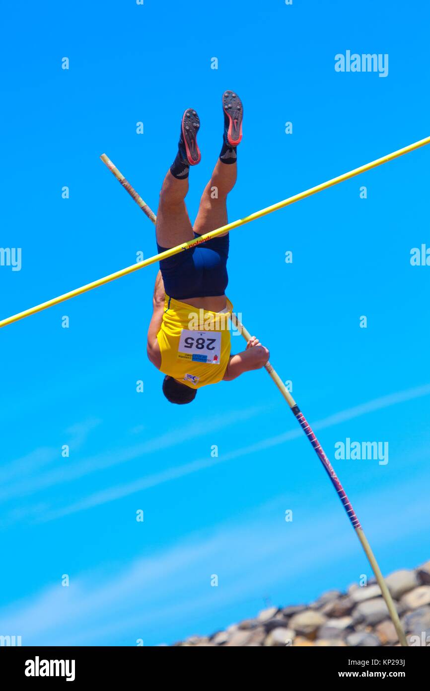 outdooor young adult male pole vaulting competition held 22nd april