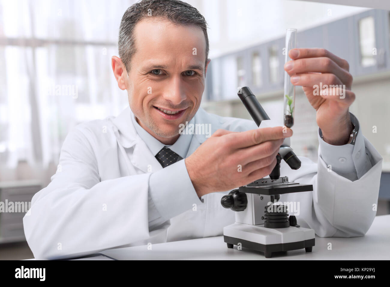 chemist working with sample Stock Photo - Alamy