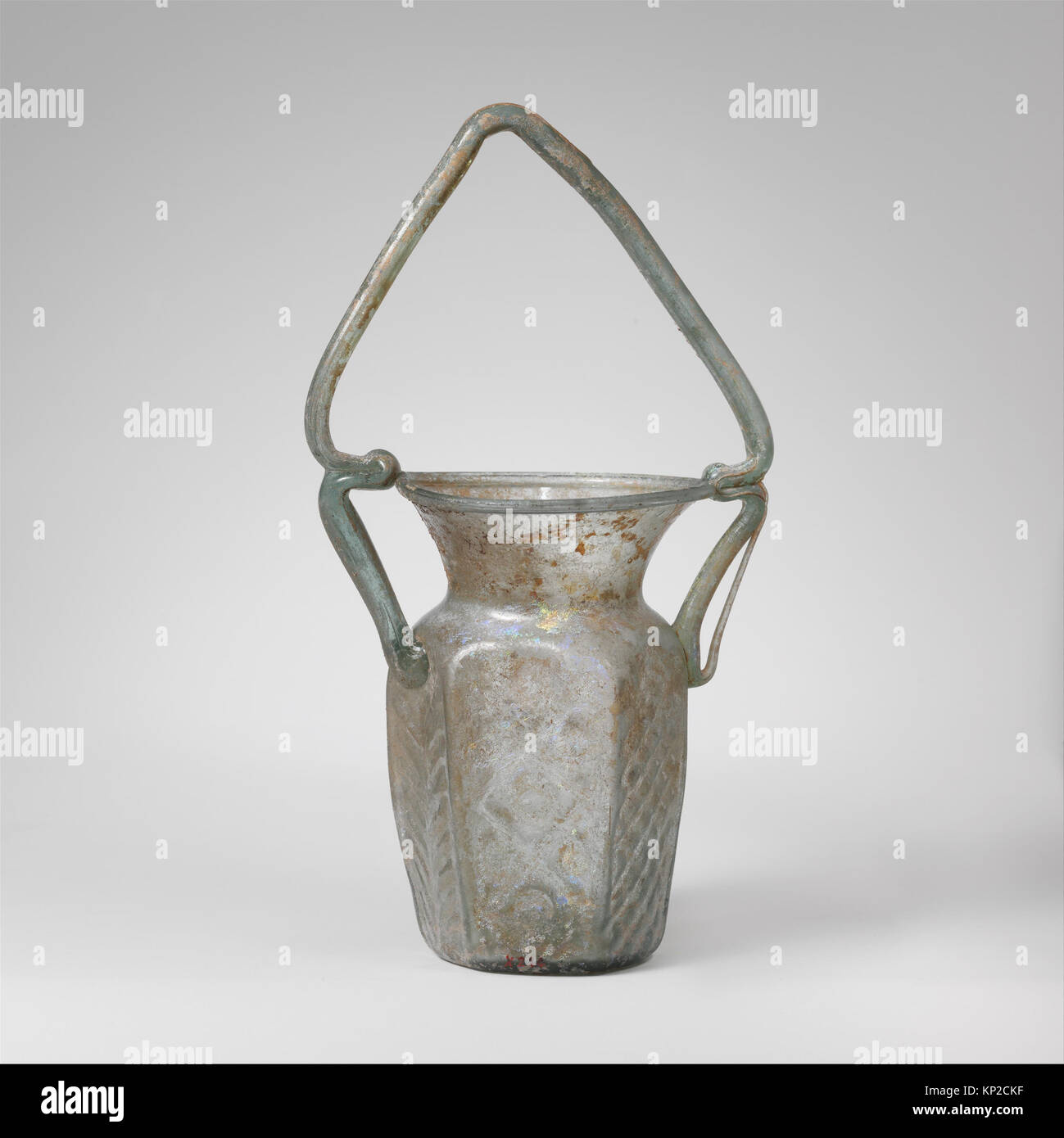 Glass hexagonal jar with basket handle MET DP108591 256768 Stock Photo