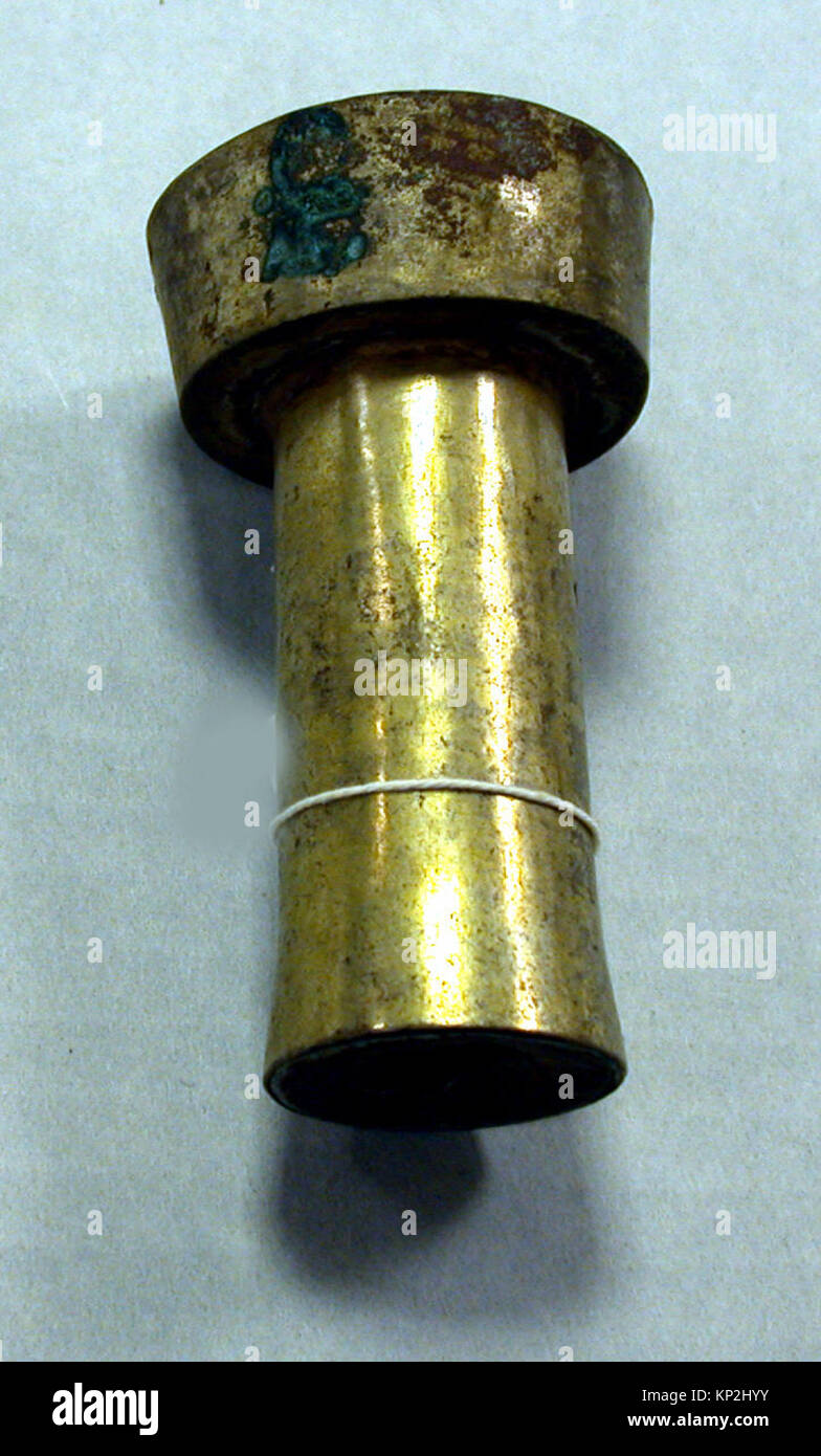 Depiction of a silver rattle beaker with hammered metal surface and ...