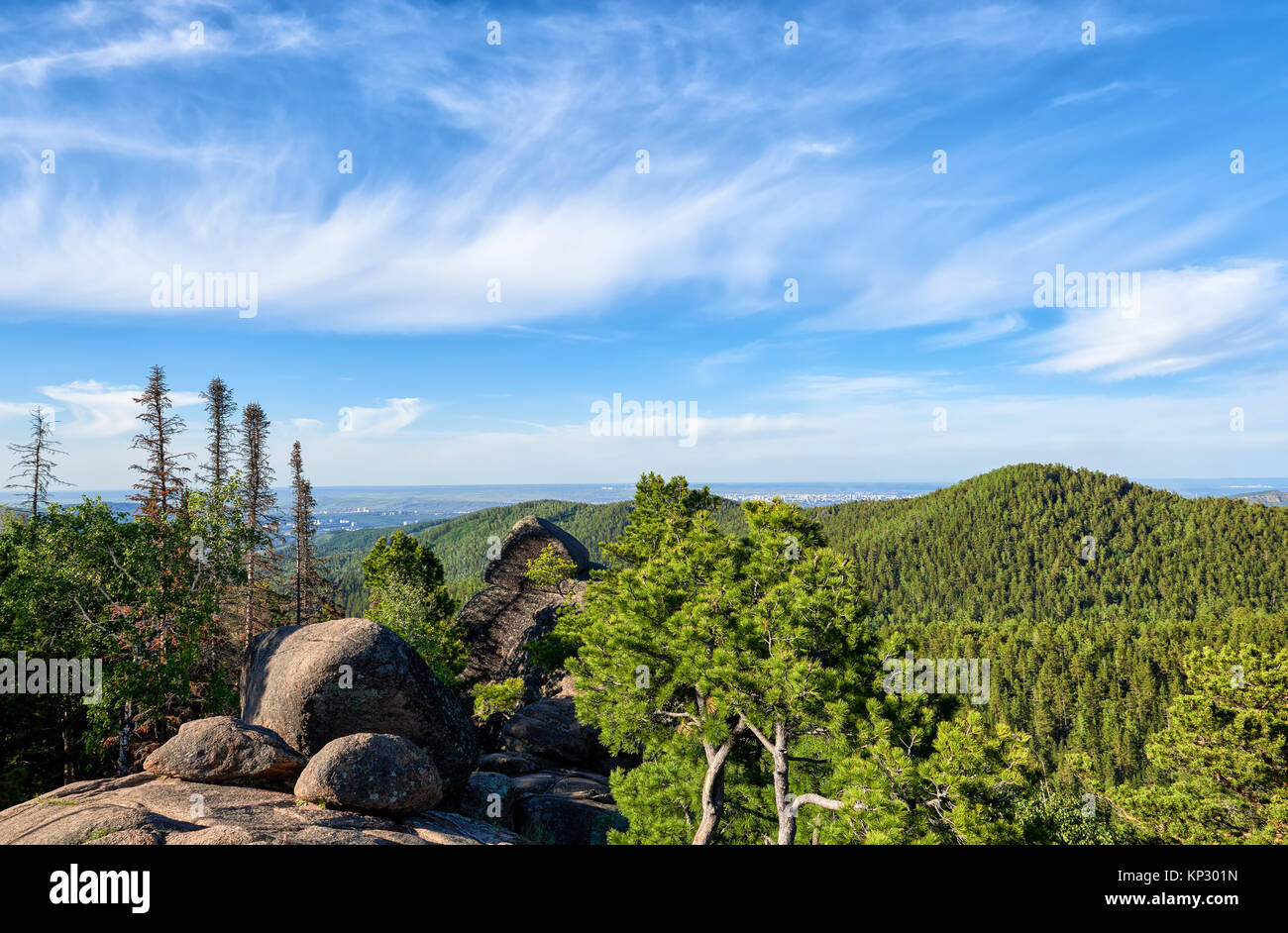 Stolby Nature Sanctuary. Beautiful sky over taiga in June. The Krasnoyarsk region. Russia Stock Photo