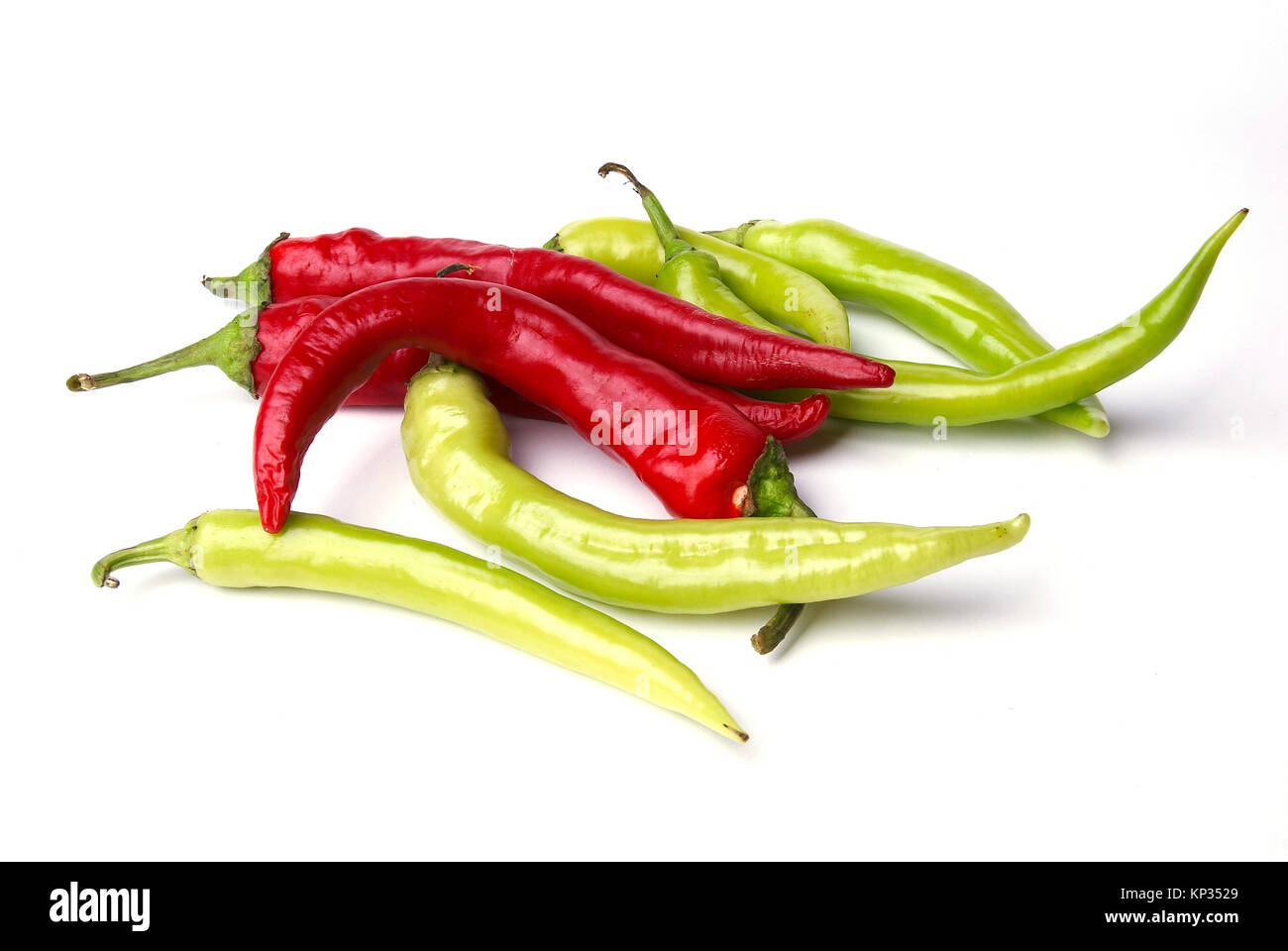 Red and green pepper isolated on white Stock Photo - Alamy