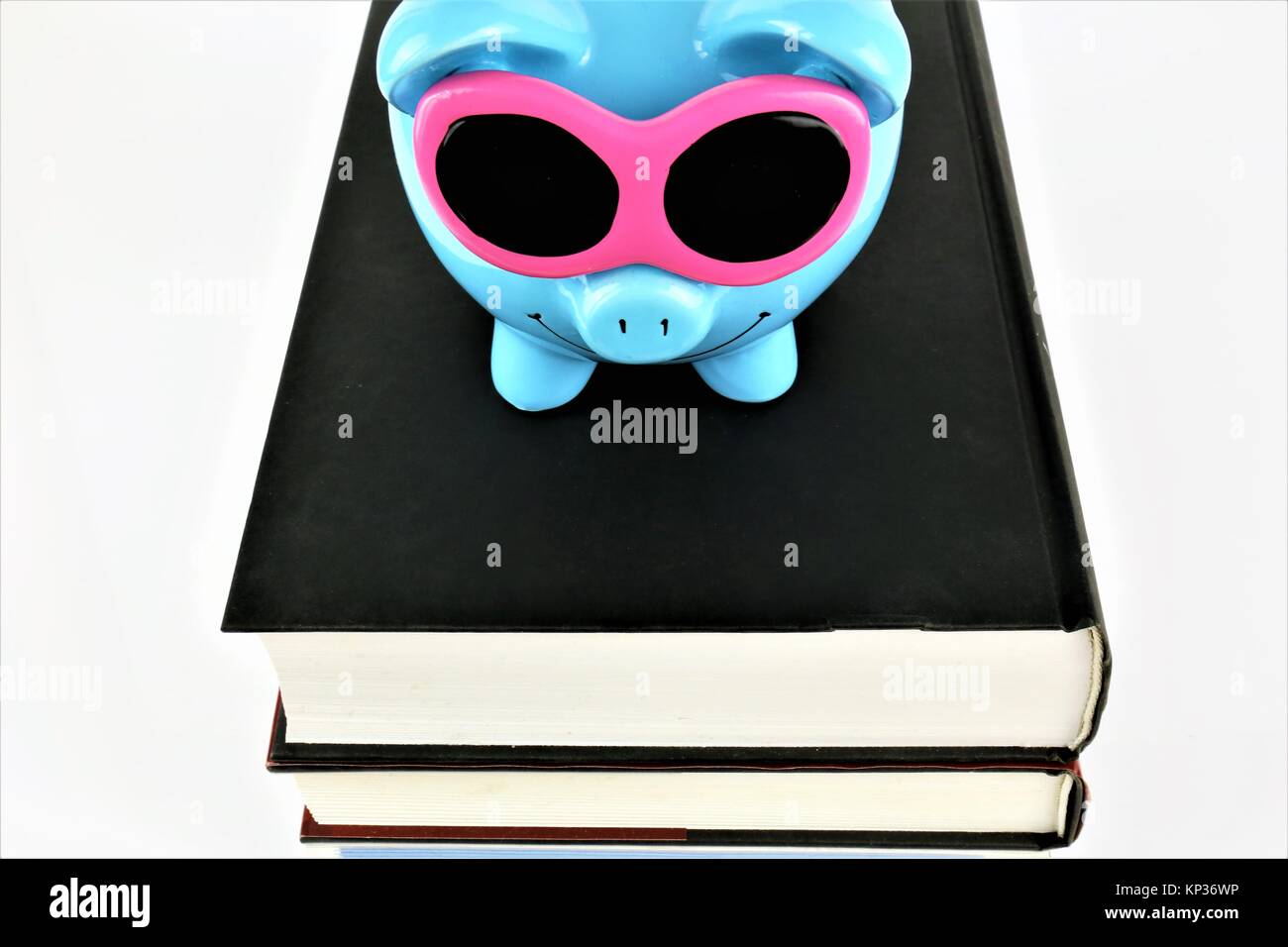 An concept image of a piggy with books Stock Photo