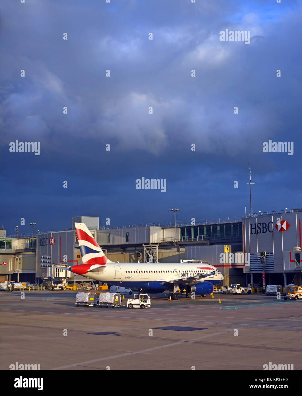 Gatwick, United Kingdon - September 20: 2017: British Airways Jet Airliner being loaded in an Autumn storm at Gatwick Airport. Stock Photo