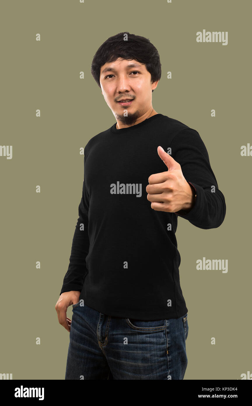 Asian guy wearing blank crew neck long t-shirt while standing on the white background, isolate include clipping path, fashion mockup and designer conc Stock Photo
