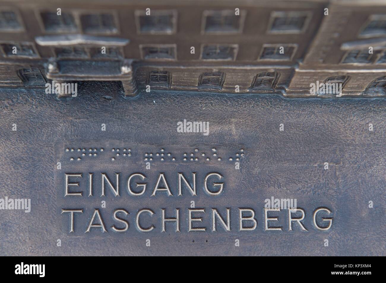 A reproduction of the Dresden Castle at a scale of 1:125 stands on a square in Dresden, Germany, 13 December 2017. The bronze 'feel' model weighs some 200 kilogrammes and was made for visually impaired and blind people as well as sighted people. Photo: Sebastian Kahnert/dpa Stock Photo