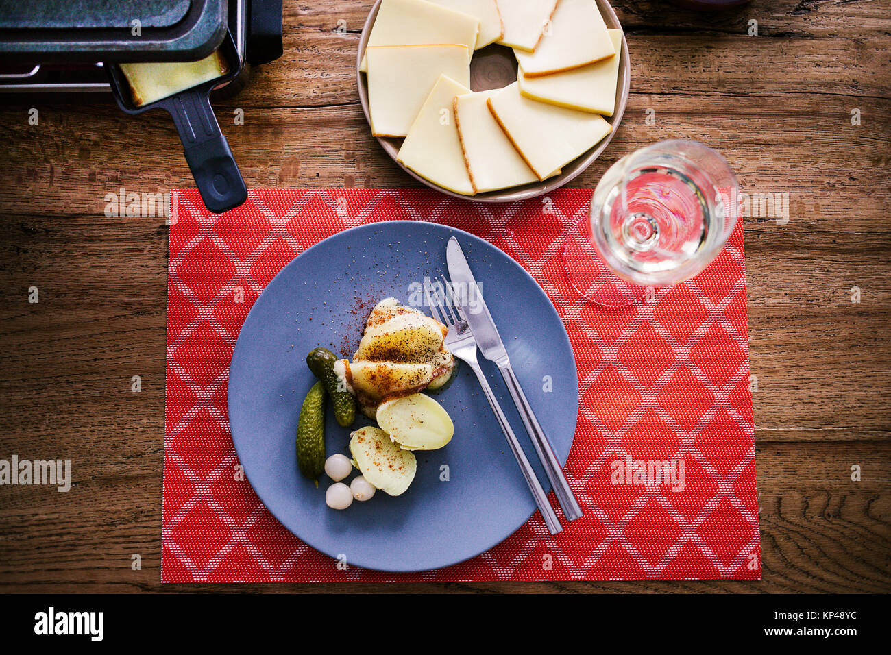 raclette cheese on a table Stock Photo - Alamy