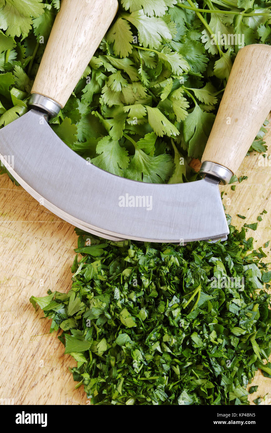 Herbal chopper chopping knife for parsley isolated on white background  Stock Photo - Alamy