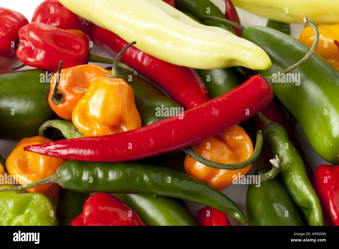 bunch of assorted kinds of chili peppers Stock Photo