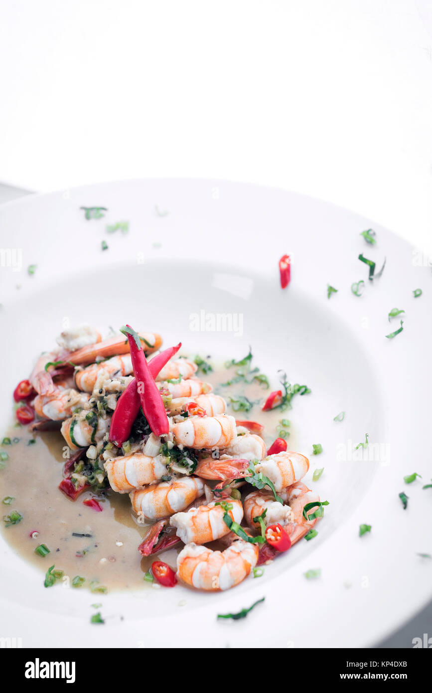 fresh mediterranean prawns in white wine garlic and chilli sauce tapas