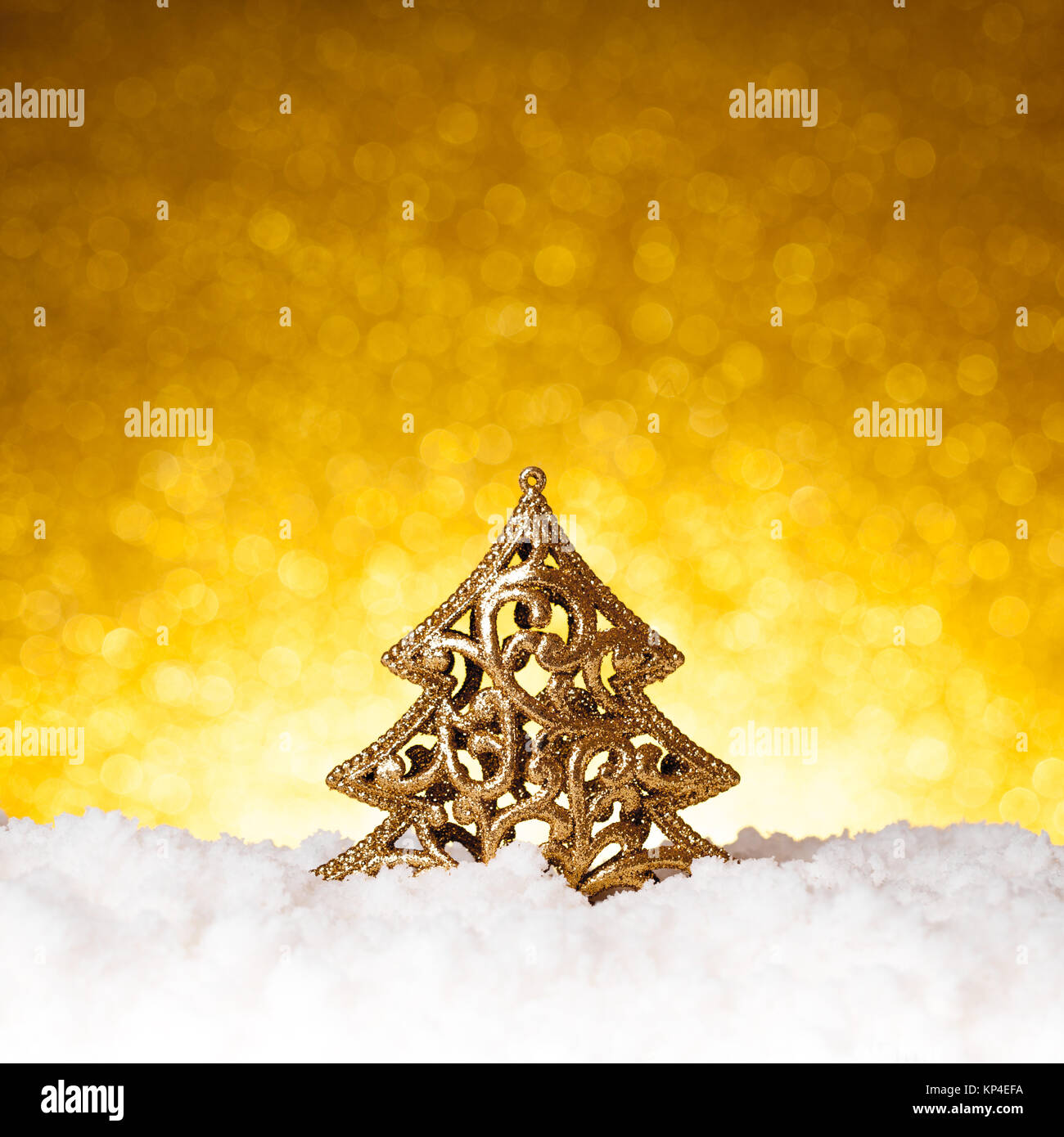 Golden christmas fir tree decoration on glitter background Stock Photo ...