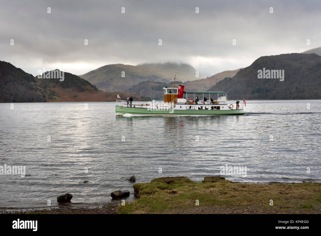 Ullswater steamer Western Belle seen on a Winter cruise on the lake off Aira Force pier, Ullswater, Lake District, Cumbria, UK Stock Photo