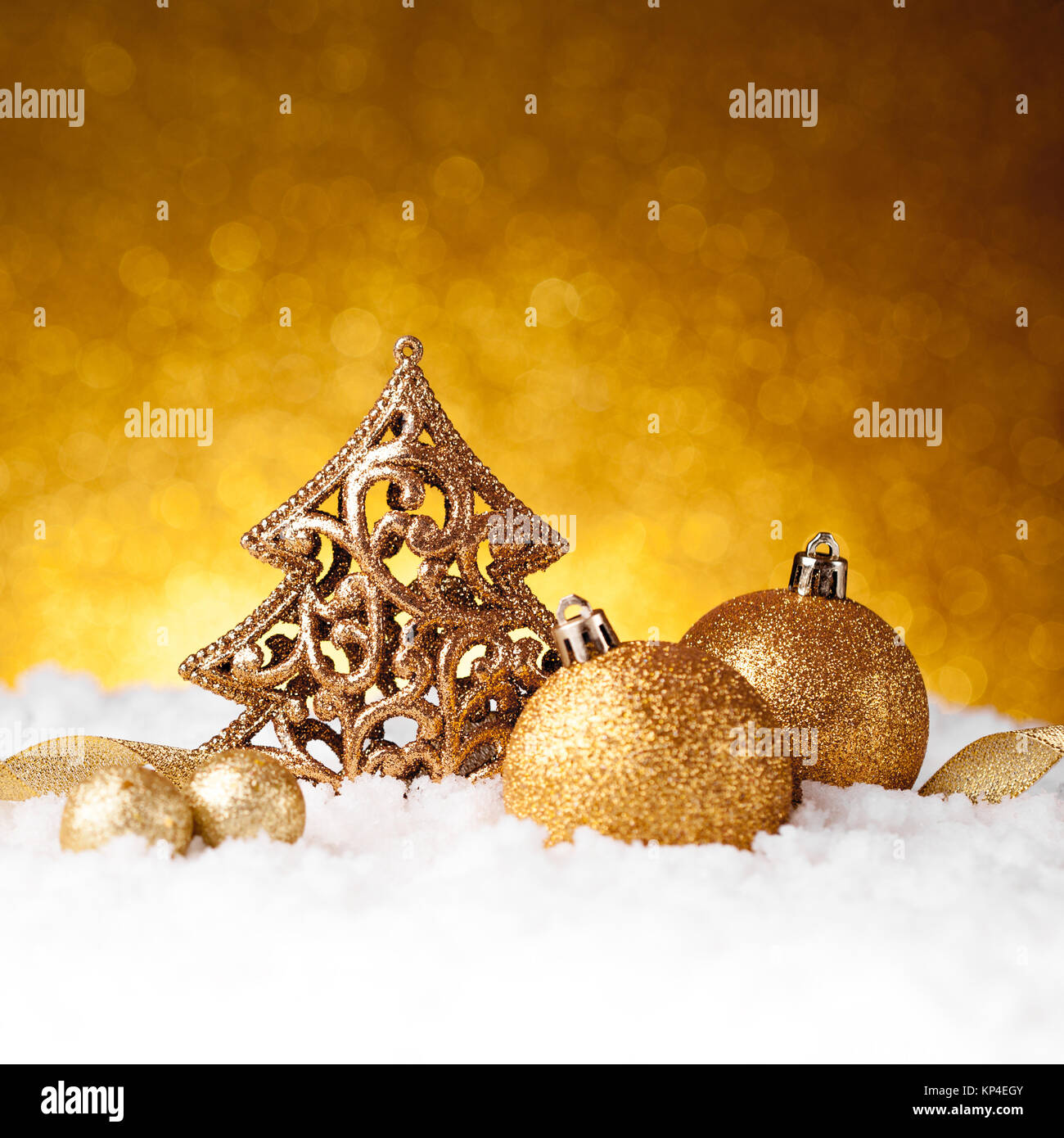 Golden christmas fir tree decoration on glitter background Stock Photo ...