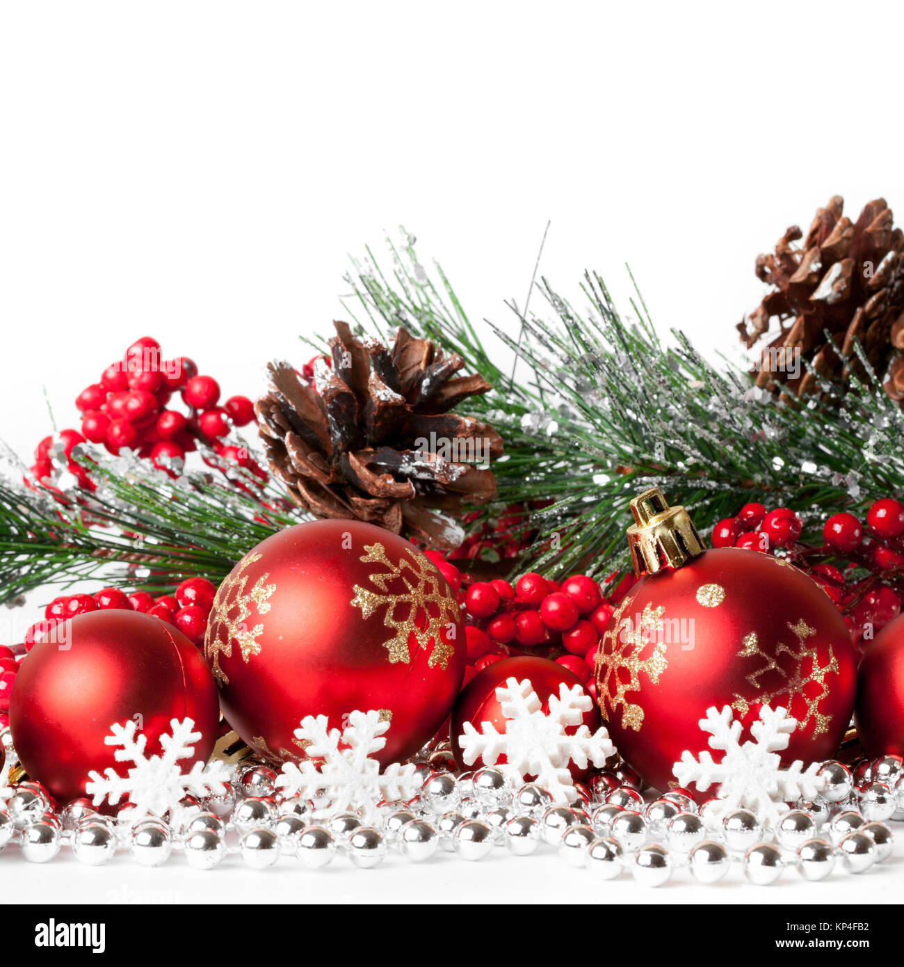 red christmas tree and balls on white. studio shot Stock Photo - Alamy