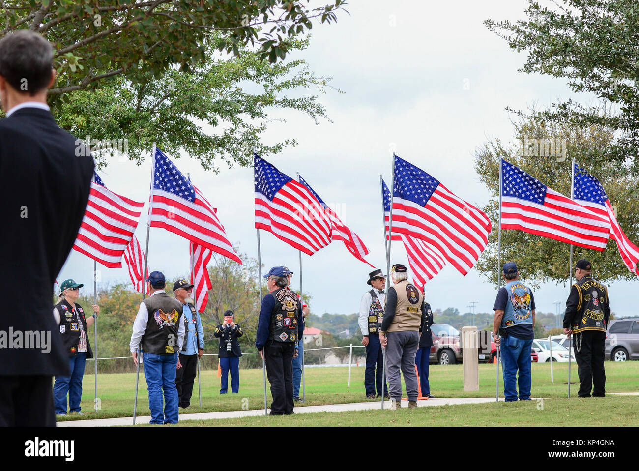 Patriot Guard Riders align along the walkway before Retired Gen. Richard E. Cavazos, the U.S. Army's first Hispanic four-star general,  internment ceremony Nov. 14, 2017, at JBSA-Fort Sam Houston National Cemetery, San Antonio, Texas. In 1976 Mexican-American Cavazos made military history by becoming the first Hispanic to attain the rank of brigadier general in the United States Army. Less than 20 years later, the native Texan would again make history by being appointed the Army's first Hispanic four-star general. He had been retired since 1984 and died Oct. 29 after a long illness at 88. (U.S Stock Photo