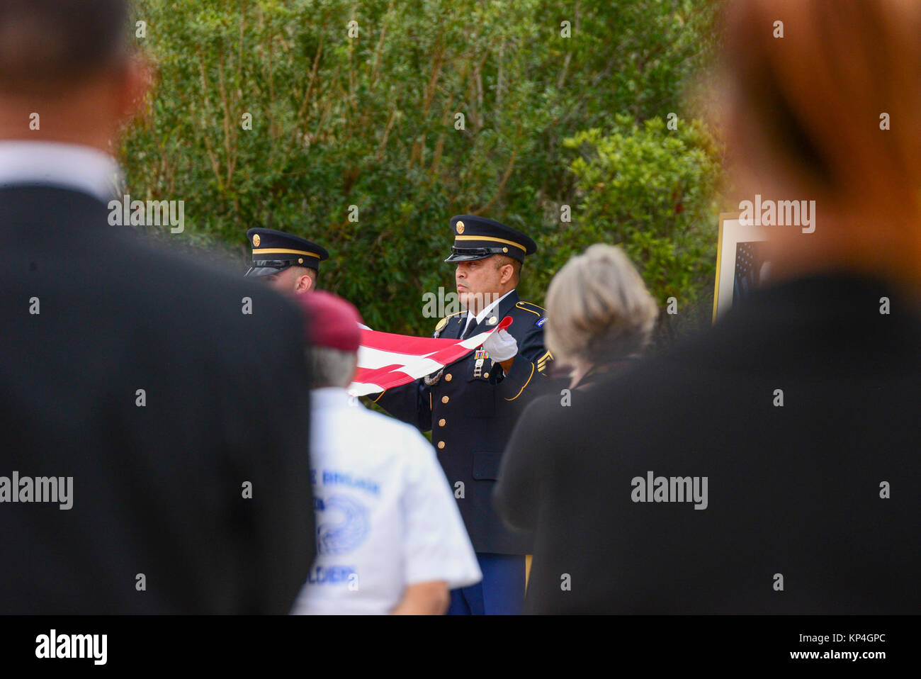 Retired Gen. Richard E. Cavazos, the U.S. Army's first Hispanic four-star general, caskets' U.S. Flag is removed and folded by the honorary pallbearers during his internment ceremony Nov. 14, 2017, at JBSA-Fort Sam Houston National Cemetery, San Antonio, Texas. In 1976 Mexican-American Cavazos made military history by becoming the first Hispanic to attain the rank of brigadier general in the United States Army. Less than 20 years later, the native Texan would again make history by being appointed the Army's first Hispanic four-star general. He had been retired since 1984 and died Oct. 29 after Stock Photo