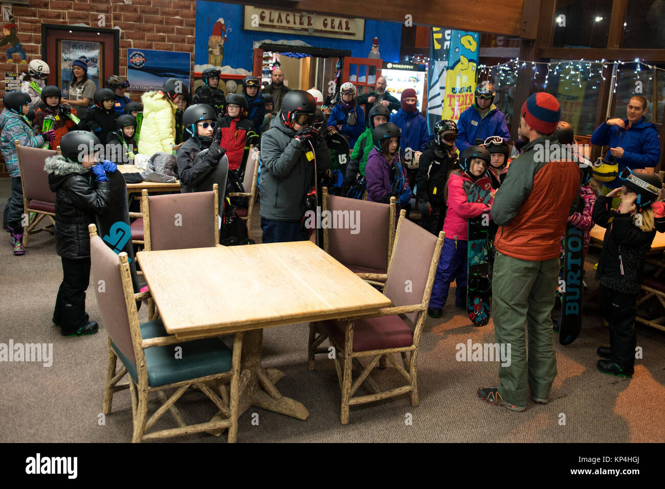 Karl Lavtar, Outdoor Adventure Program lead, instructs children at the