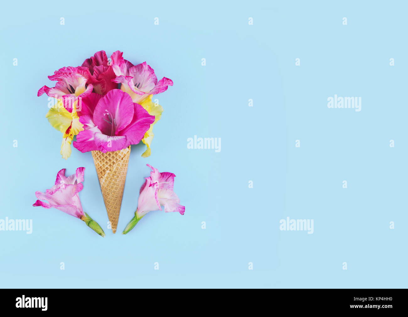 Waffle cone with composition of flowers. Flat lay style Stock Photo - Alamy
