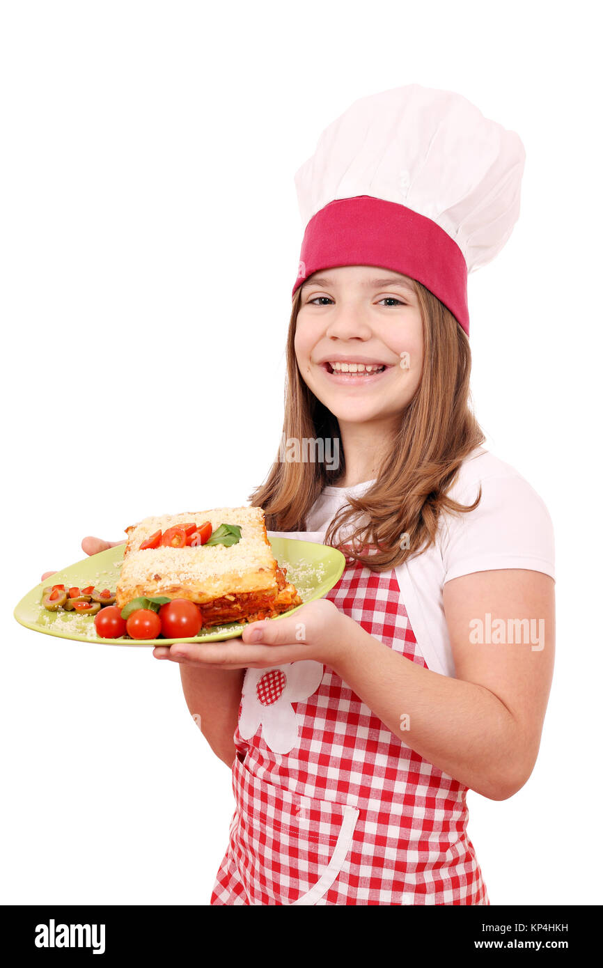 happy little girl cook with tasty Italian lazagne Stock Photo