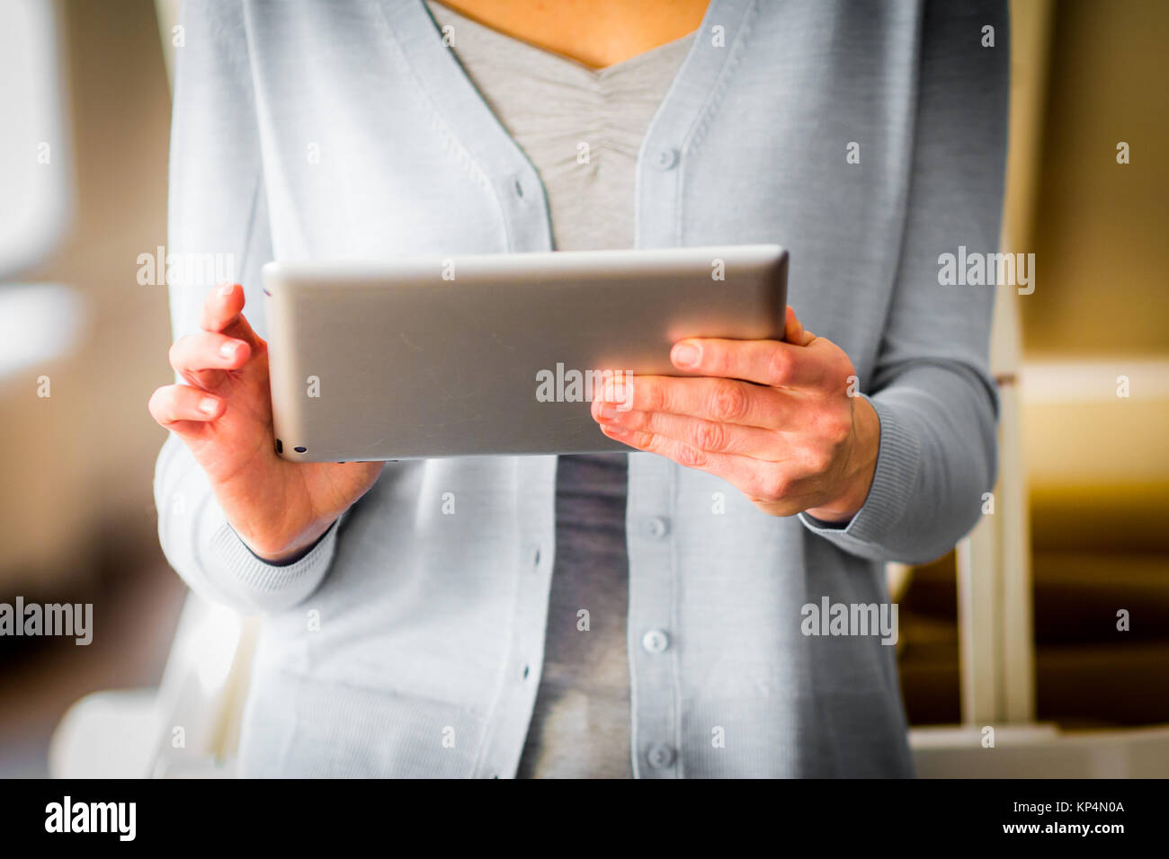 Woman using digital tablet. Stock Photo