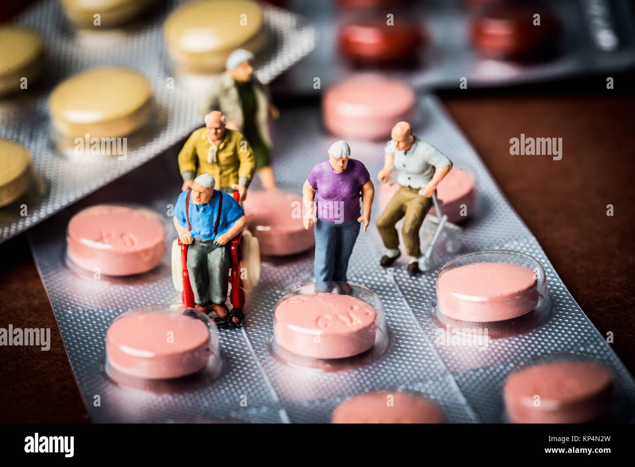 Conceptual image on medication use by the elderly personn. Stock Photo