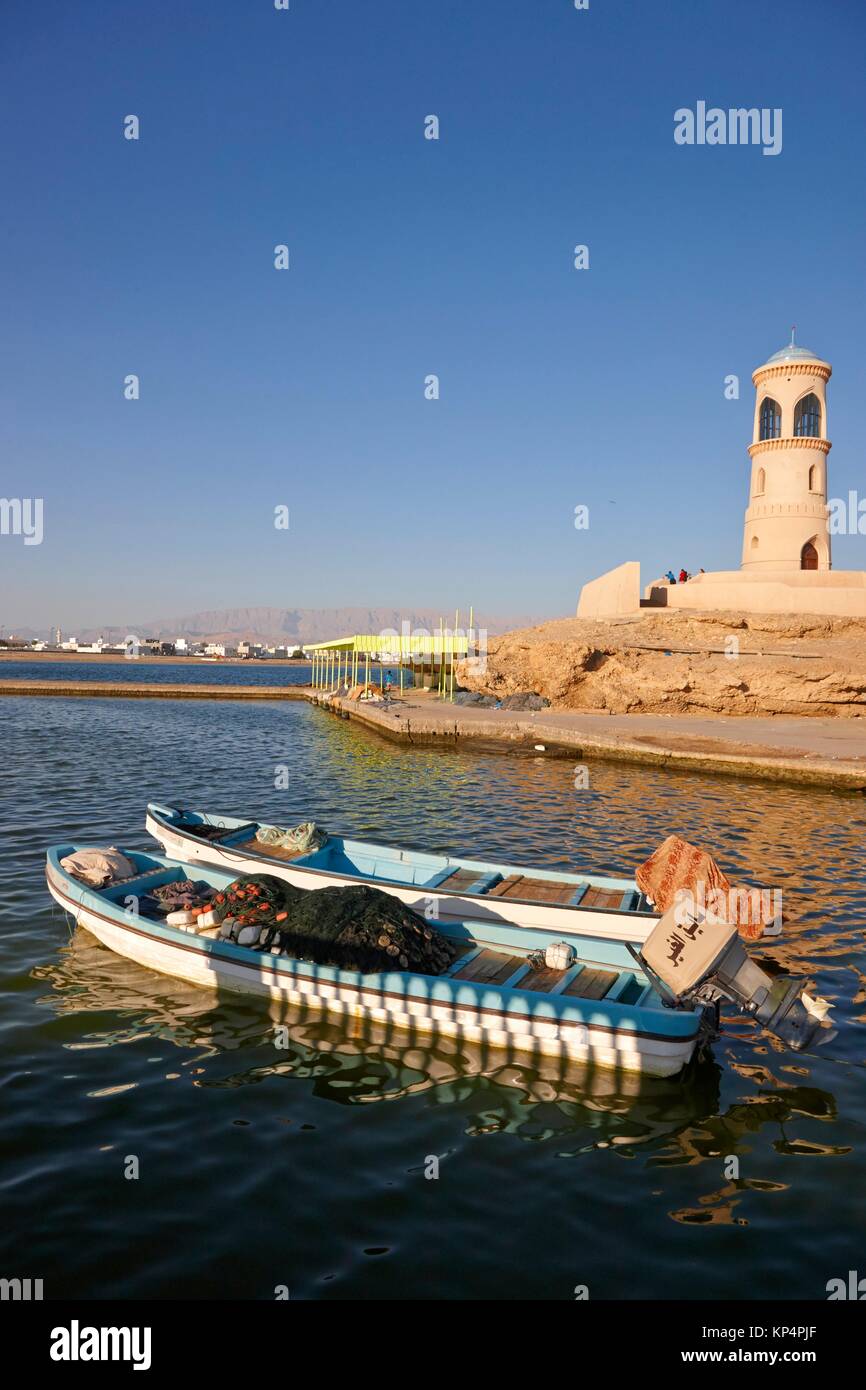 Fishing boats and lighthouse, Sur, Sultanate of Oman Stock Photo