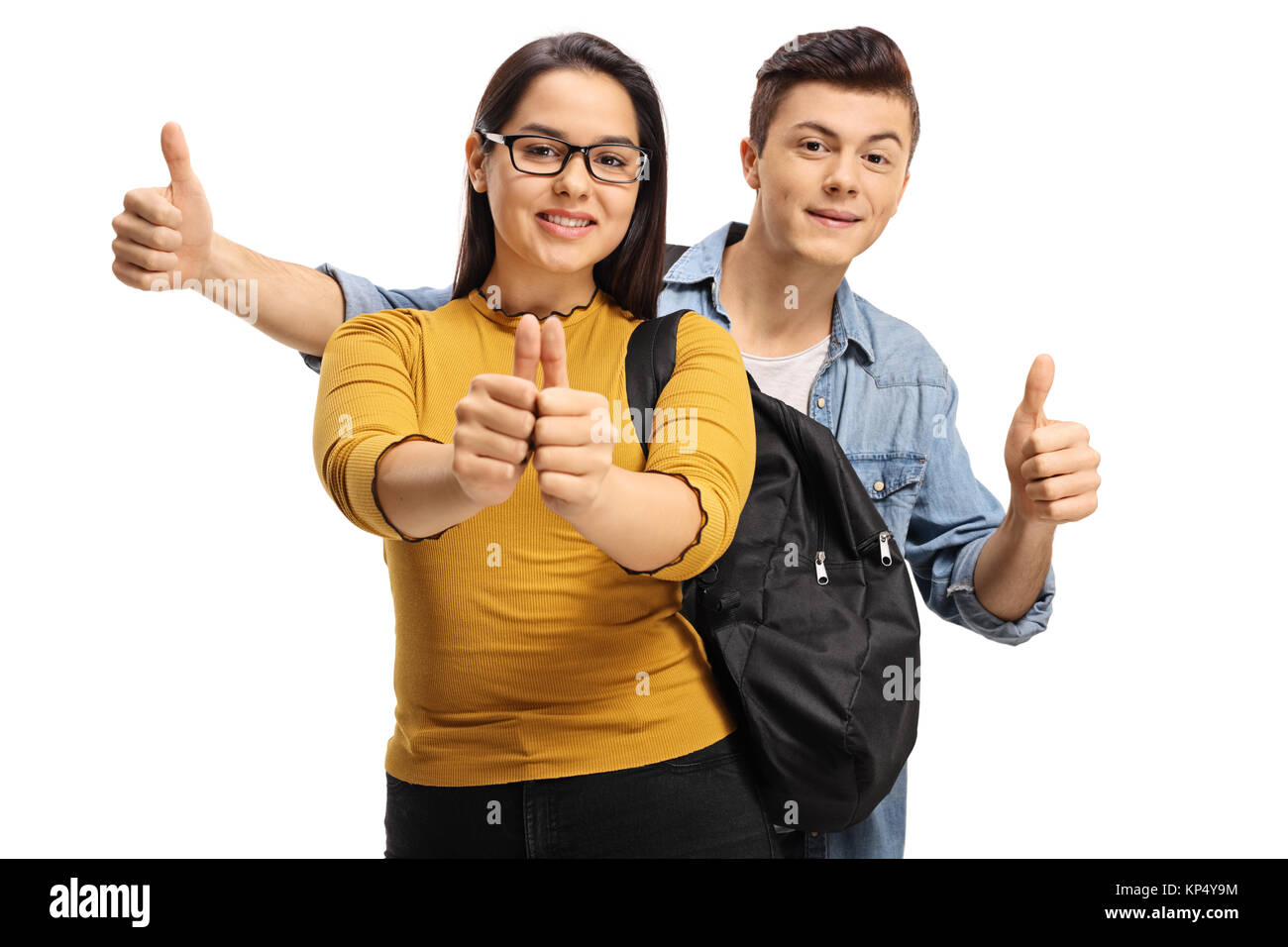 Teenage students making thumb up gestures isolated on white background Stock Photo