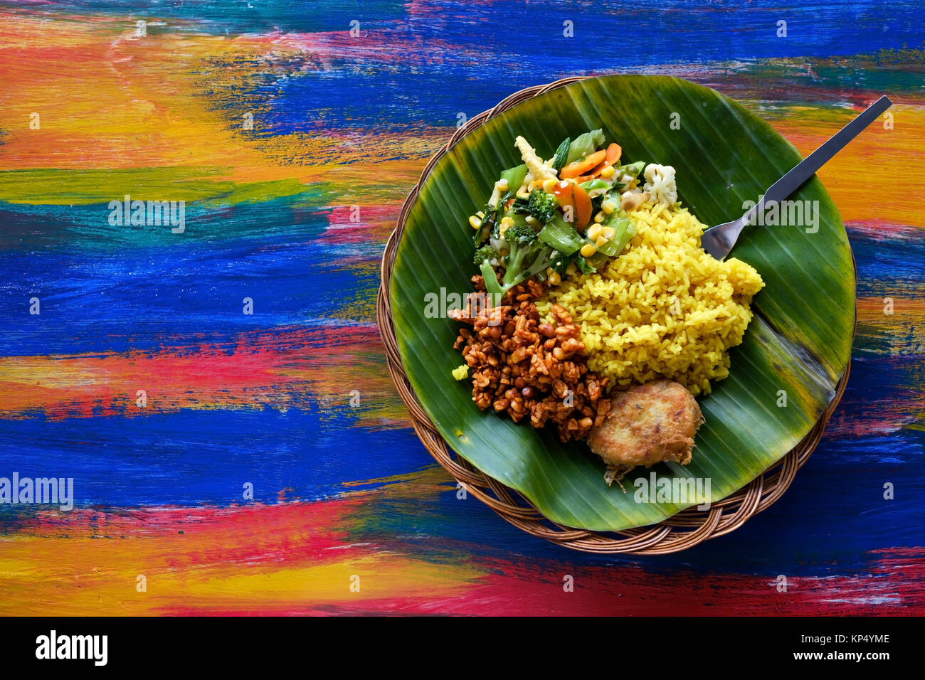 Vegan or vegetarian restaurant dishes top view, hot spicy indian rice in bowl. Healthy traditional eastern local food without meat Stock Photo