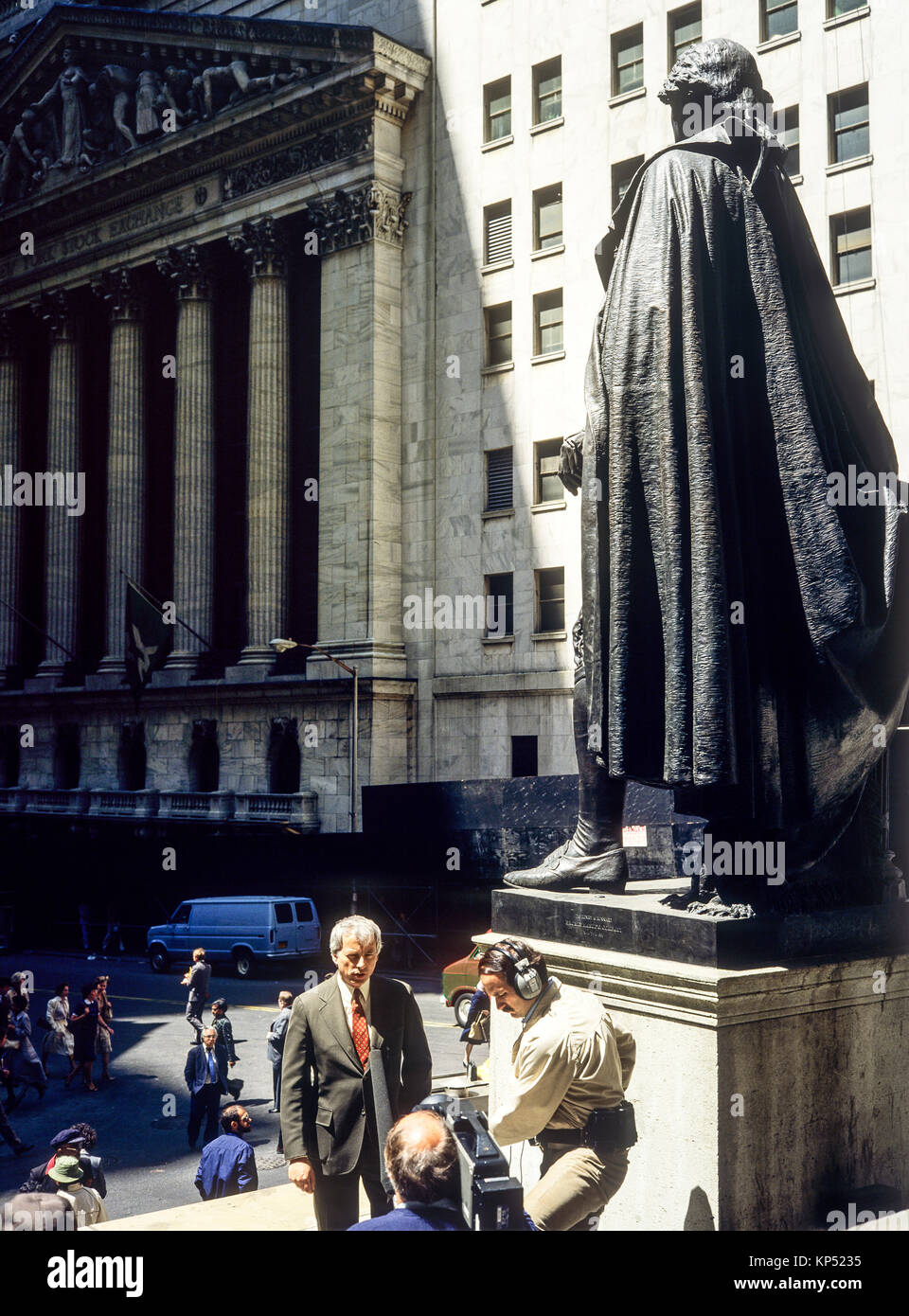 May 1982,New York,TV crew,interview,George Washington statue,Stock Exchange building facade,Broad street,Manhattan,New york City,NY,NYC,USA, Stock Photo