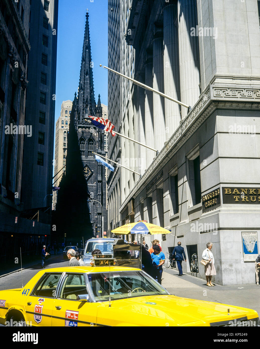 May 1982,New York,Wall street,yellow cab,Trinity church,financial district,lower Manhattan,New york City,NY,NYC,USA, Stock Photo