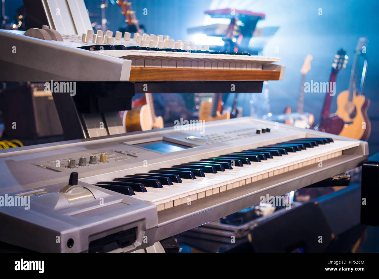professional keyboards on guitars and light sunset Stock Photo Alamy