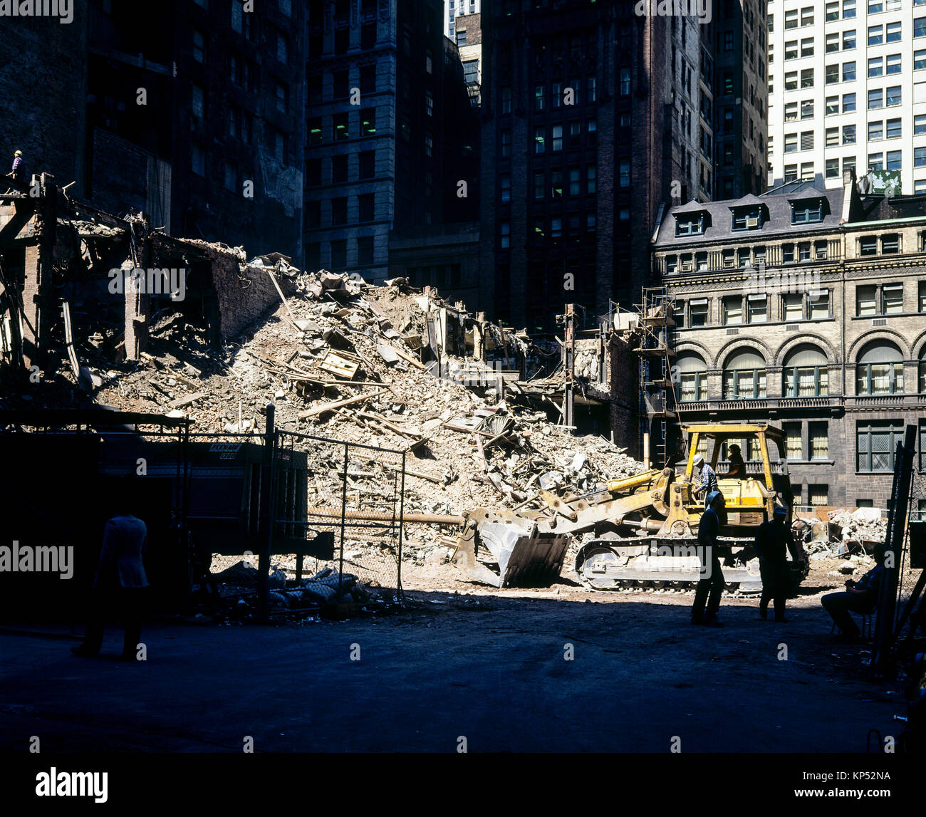 May 1982,New York,demolition site,bulldozer,construction workers,Wall street,financial district,New york City,NY,NYC,USA, Stock Photo