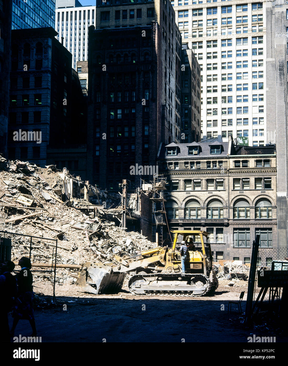 May 1982,New York,demolition site,bulldozer,construction workers,Wall street,financial district,New york City,NY,NYC,USA, Stock Photo