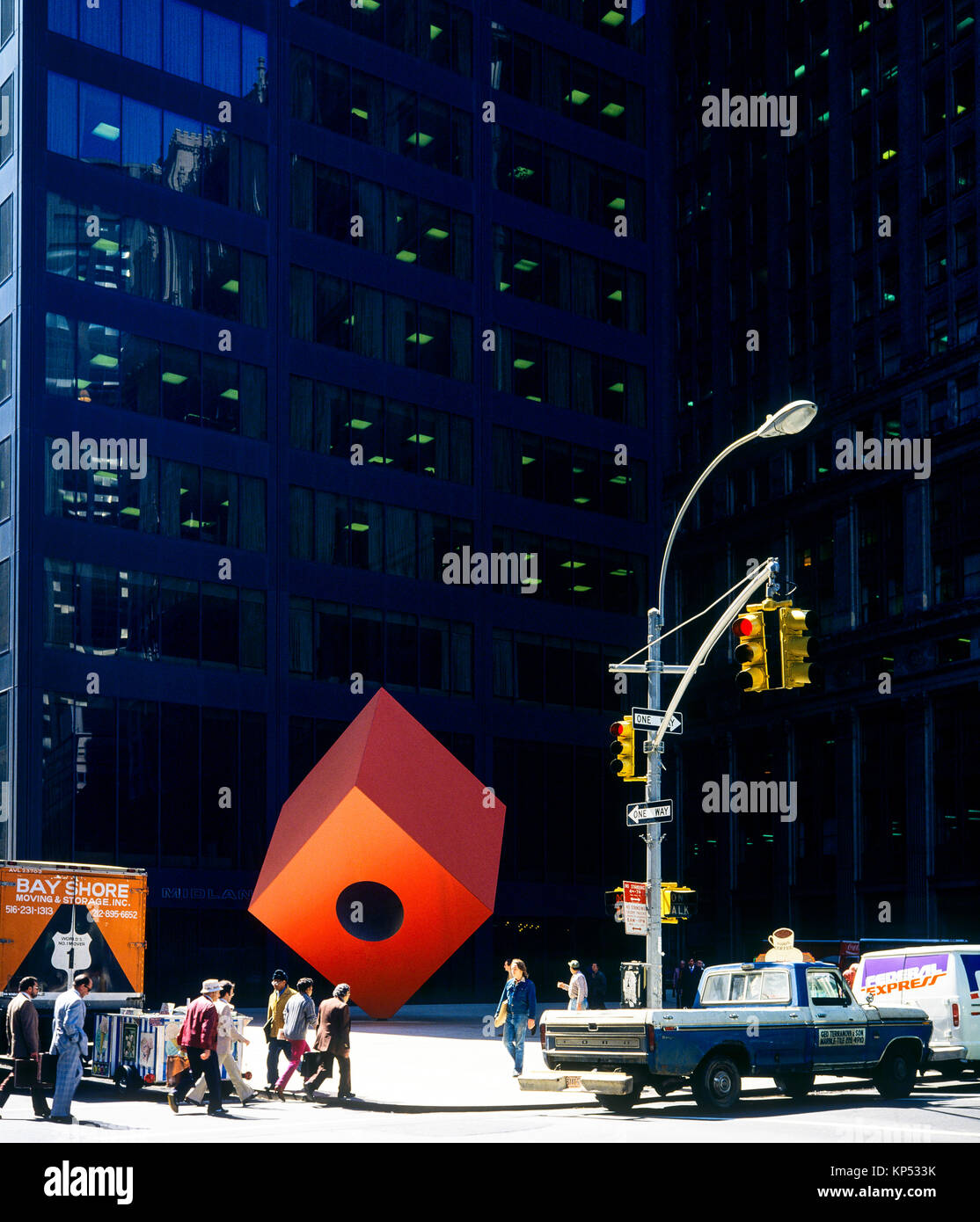 May 1982,New York,The Red Cube sculpture by Isamu Noguchi 1968,140 Broadway,financial district,lower Manhattan,New york City,NY,NYC,USA, Stock Photo