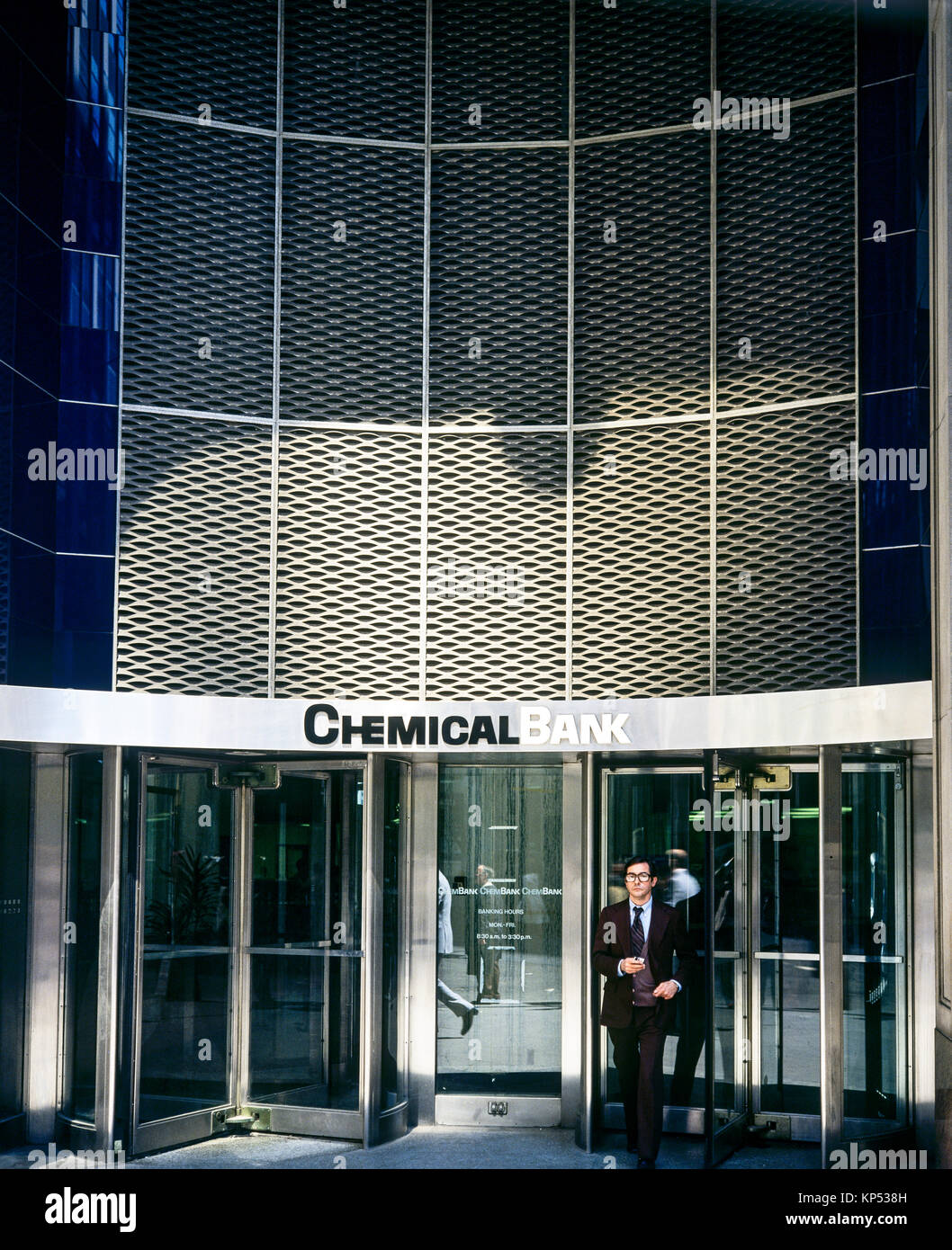 May 1982,New York,man walking out,Chemical bank entrance,financial district,lower Manhattan,New york City,NY,NYC,USA, Stock Photo