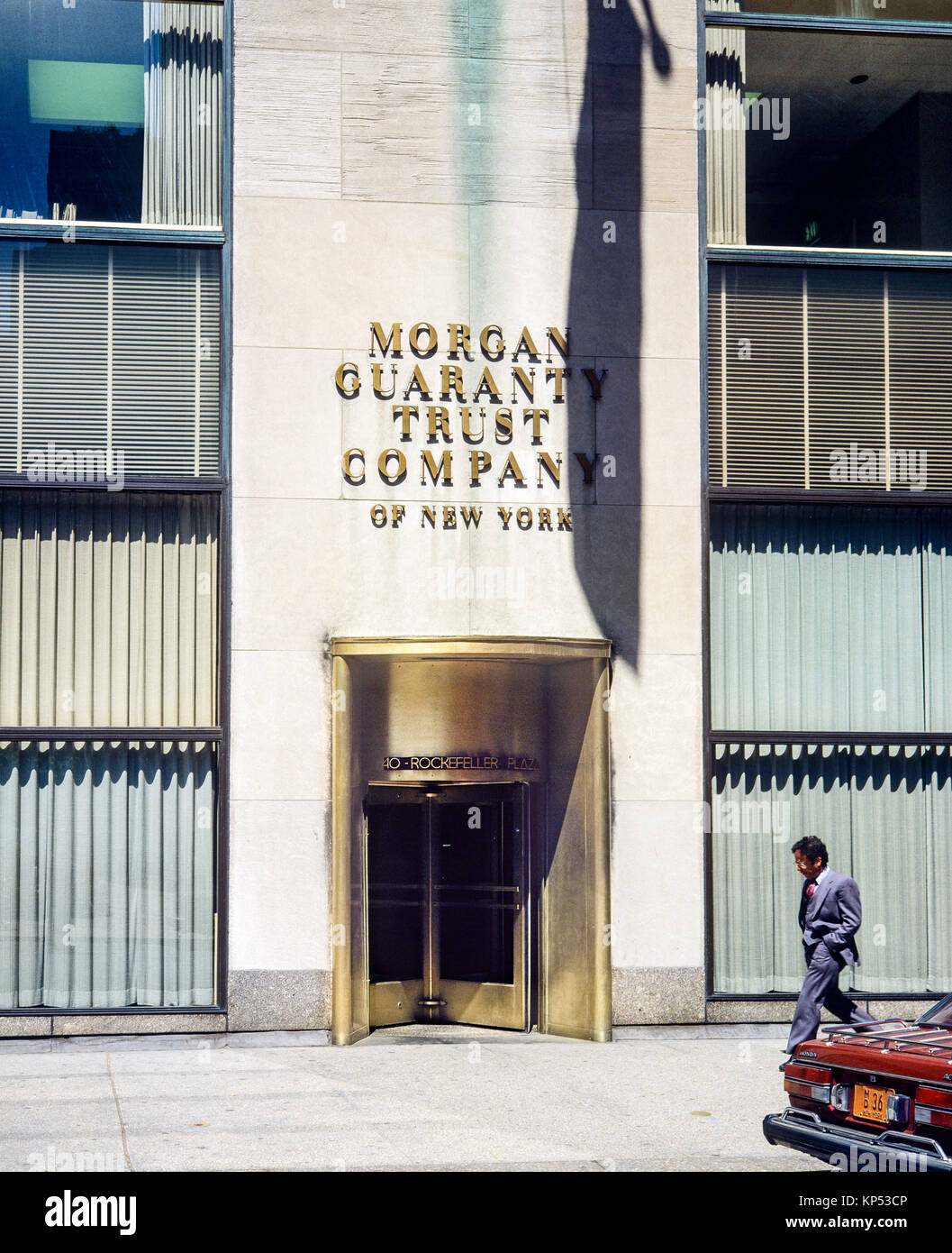 May 1982,New York,Morgan Garanty Trust Company of New York bank entrance,brass revolving door,one man,Manhattan,New york City,NY,NYC,USA, Stock Photo
