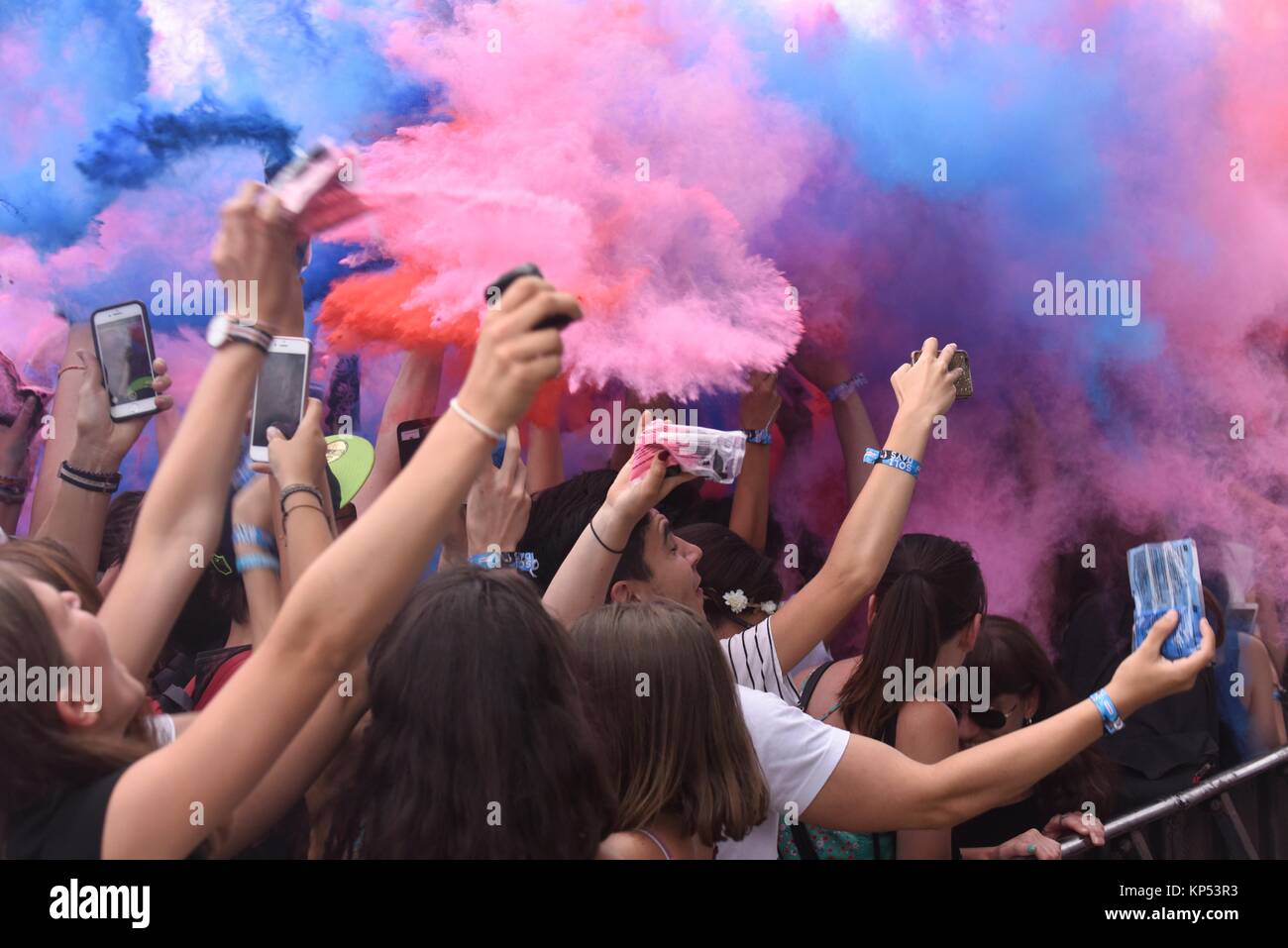 A ''Color Party'' where everyone throws packets of coloured powder at each other during the Solidays Festival in Paris Longchamps Hippodrome,24 th Stock Photo