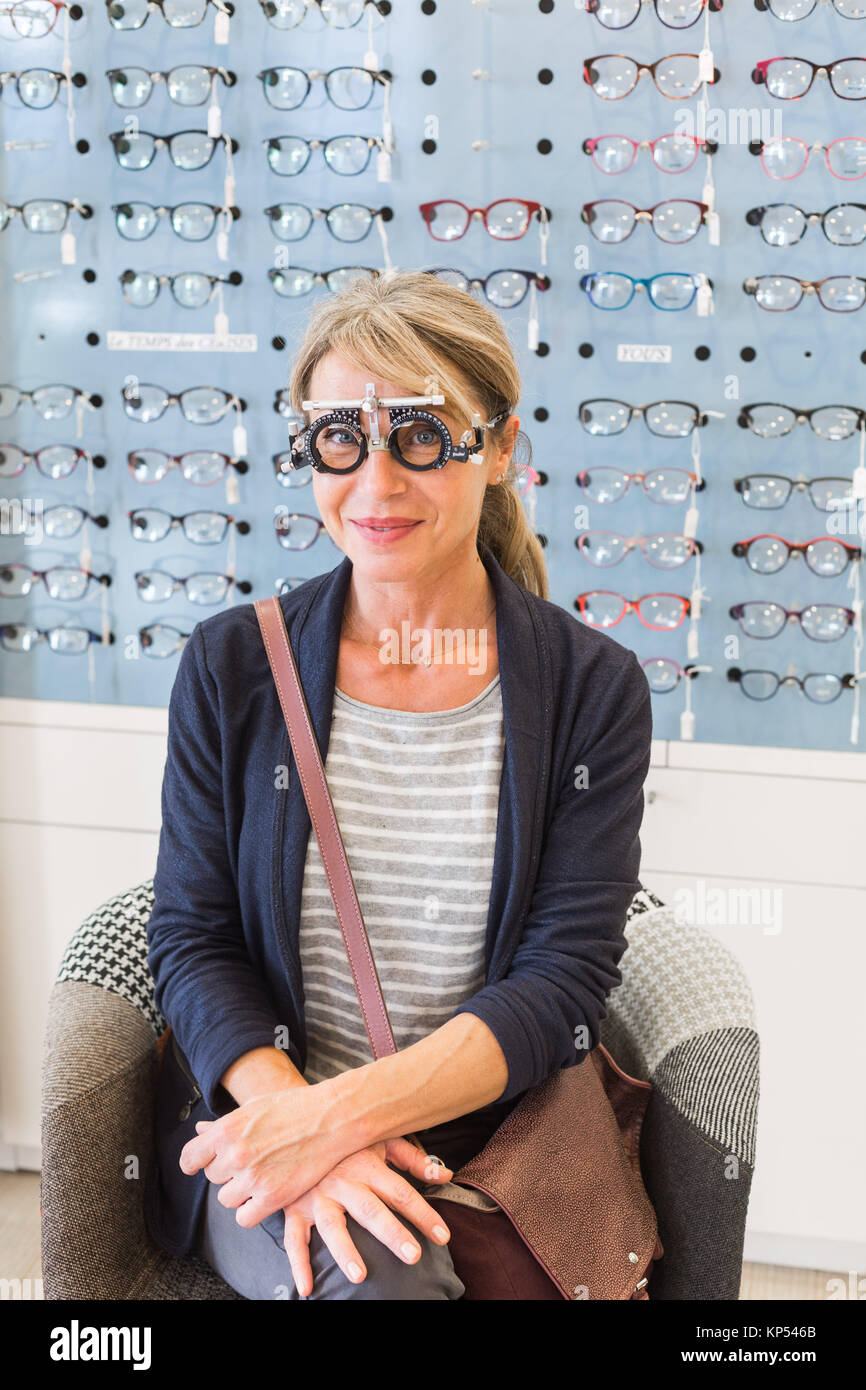 Eye examination by an optician Stock Photo Alamy