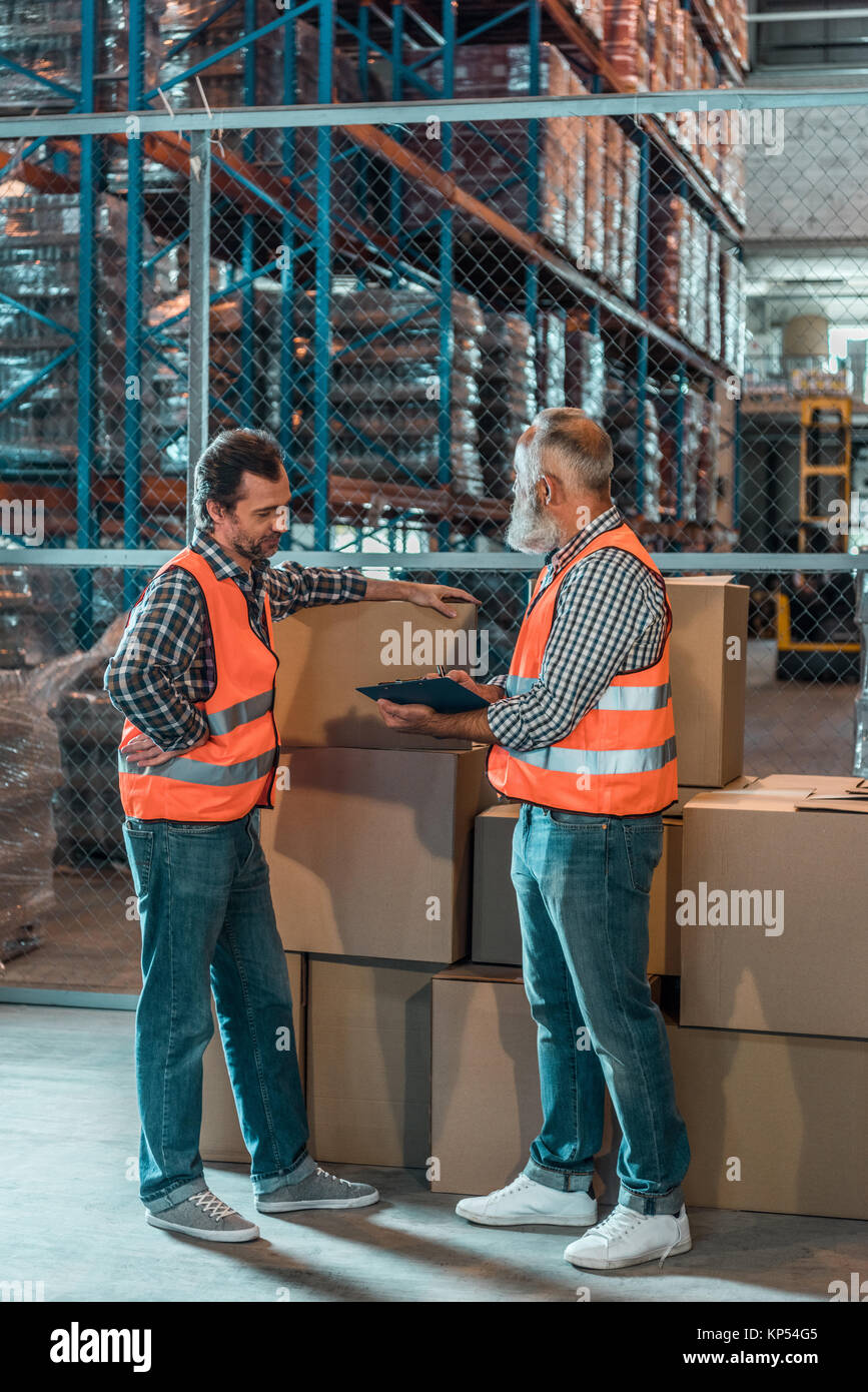 warehouse workers with clipboard  Stock Photo