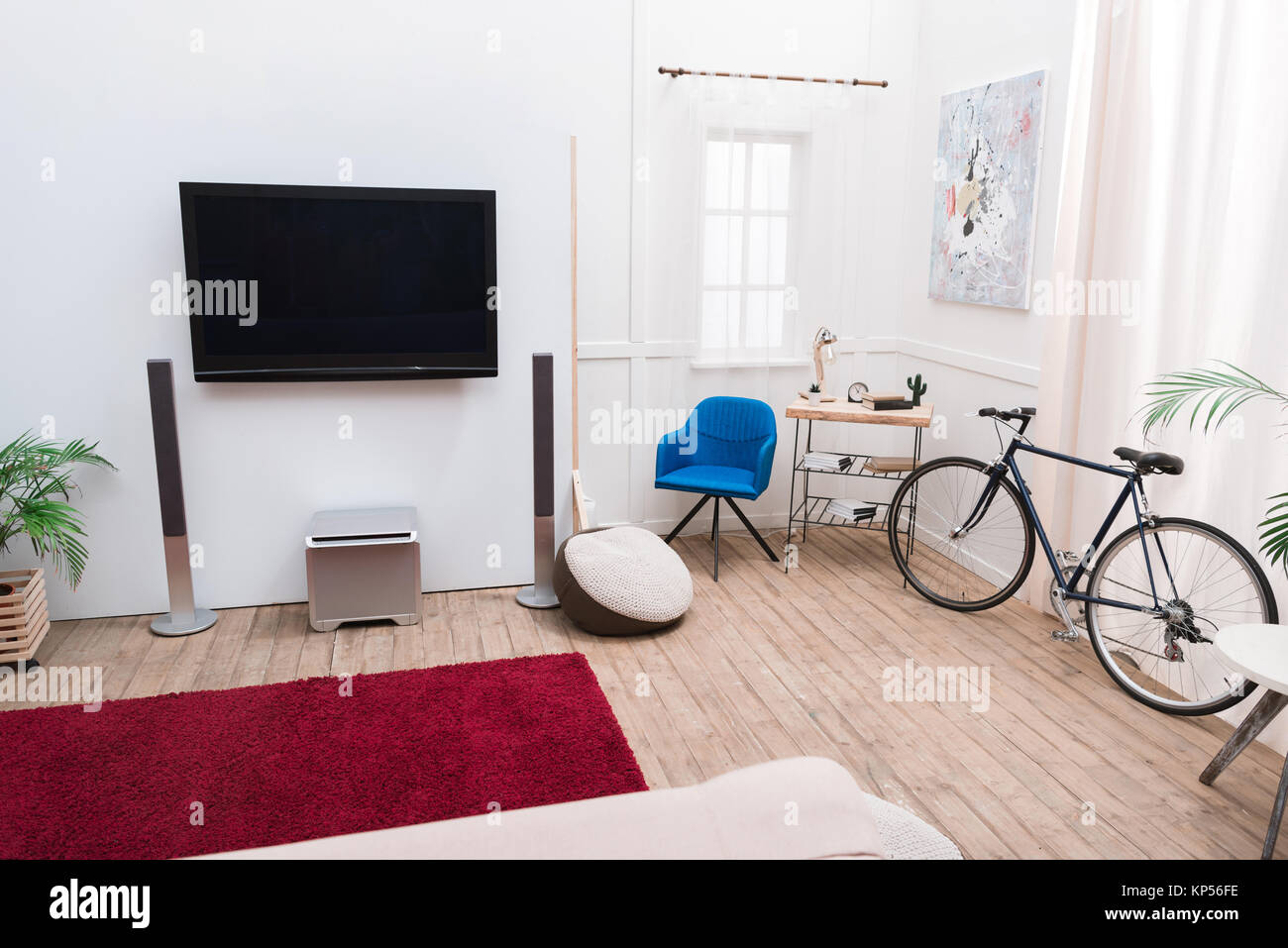 Interior of the living room with TV screen and sound speakers Stock Photo