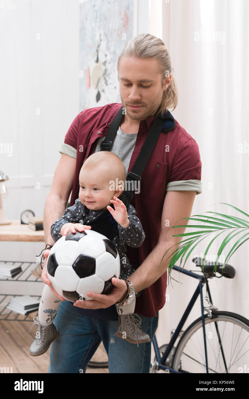 baby holding sling