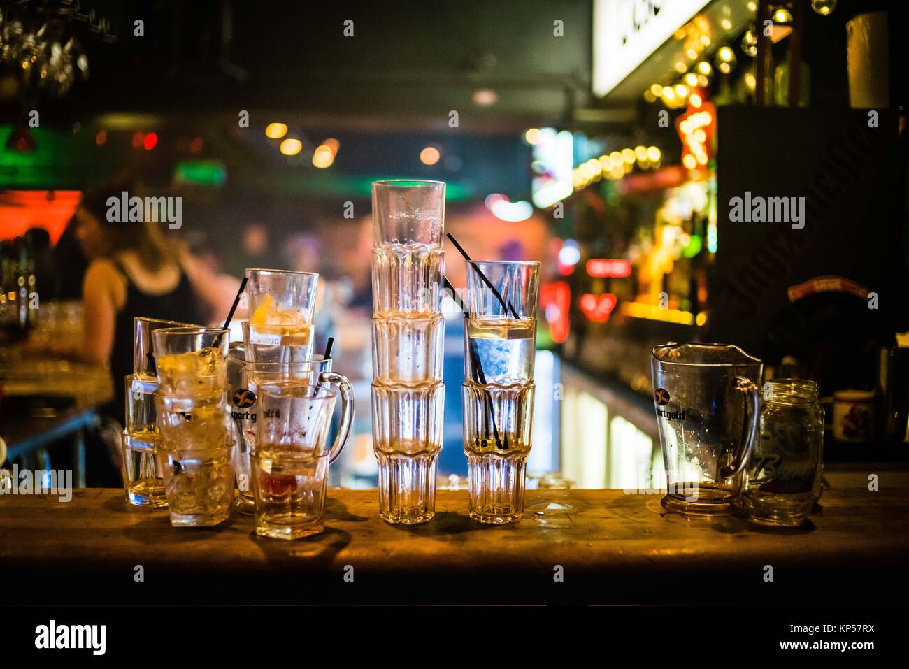 Empty glasses on a bar counter. Stock Photo