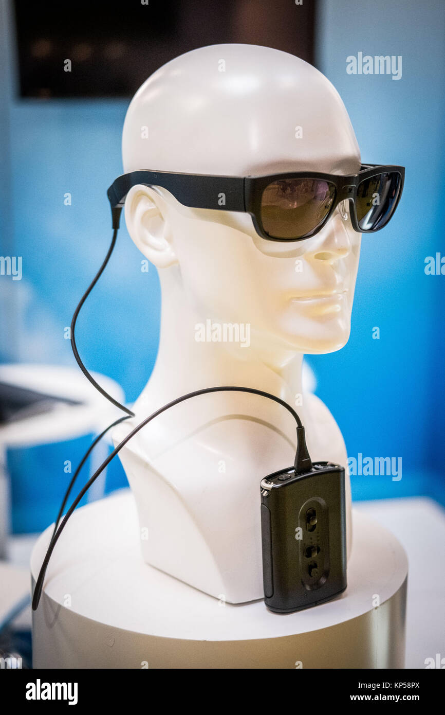 Second Sight ®, Retinal prosthesis for blind persons comprising spectacles and a video processing unit connected to an epiretinal prosthesis implanted Stock Photo