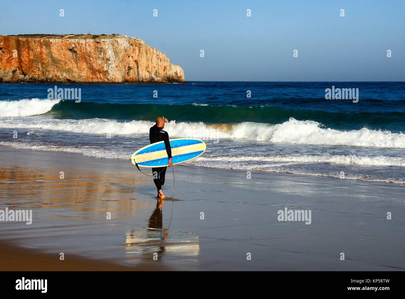 Europe, Portugal, Southern Portugal , Algarve region , Faro district , Sagres, Mareta beach - Praia da Mareta , single male surfer with surfboard Stock Photo