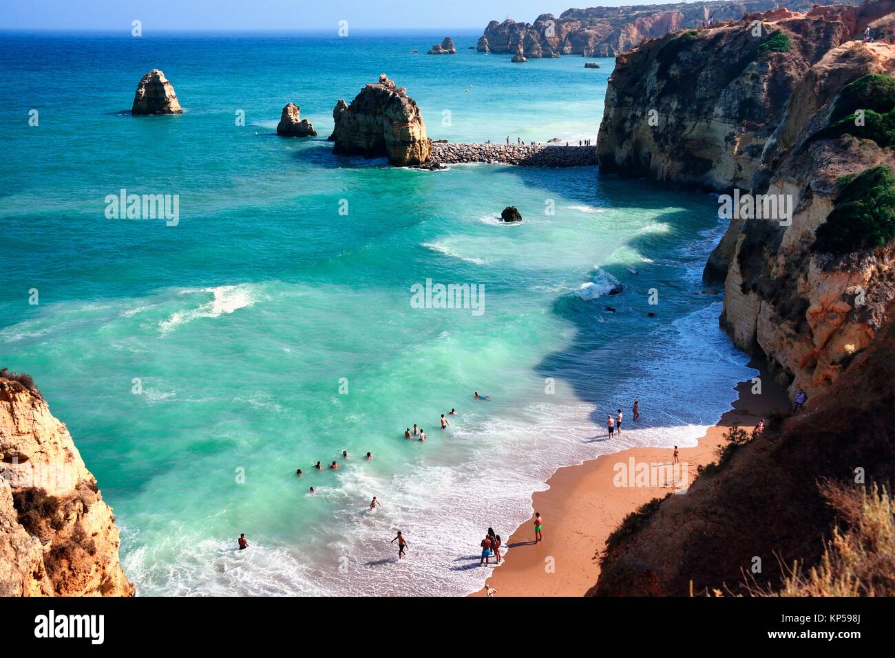Praia Pinhao and coasline landscape, in far background Ponta da Piedade