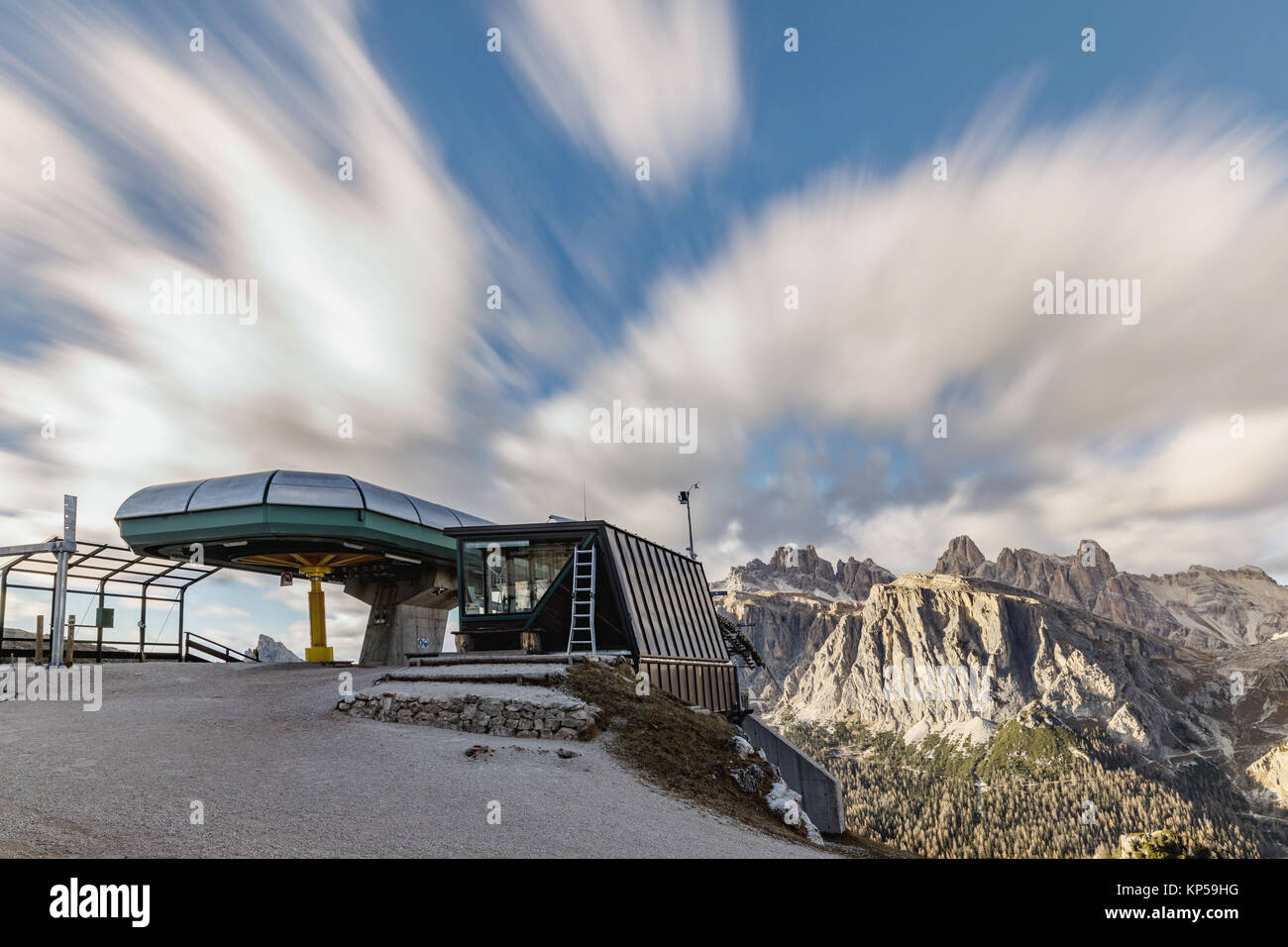 Upper station of the cable car, in the background Dolomites and clouds in motion. Dolomites Alps, Italy, Stock Photo